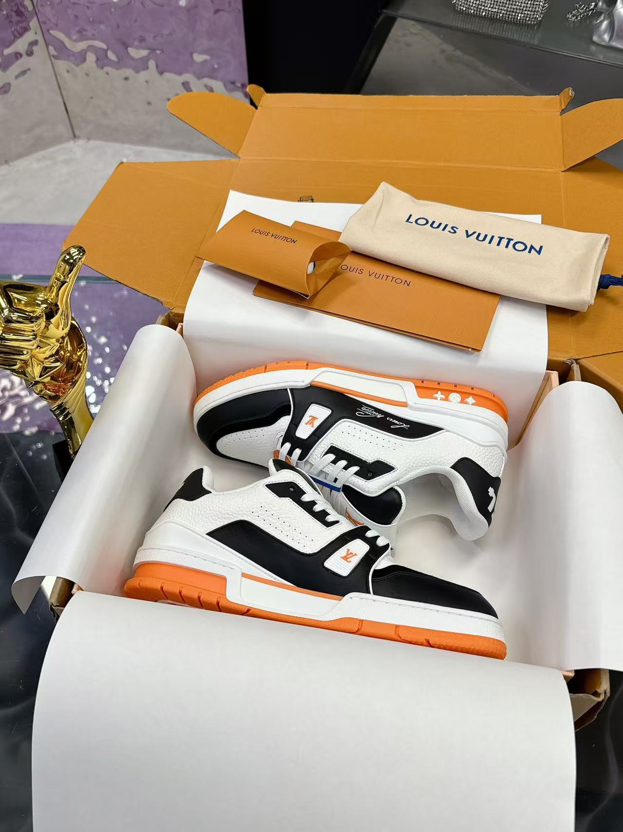 LV trainer orange, white and black