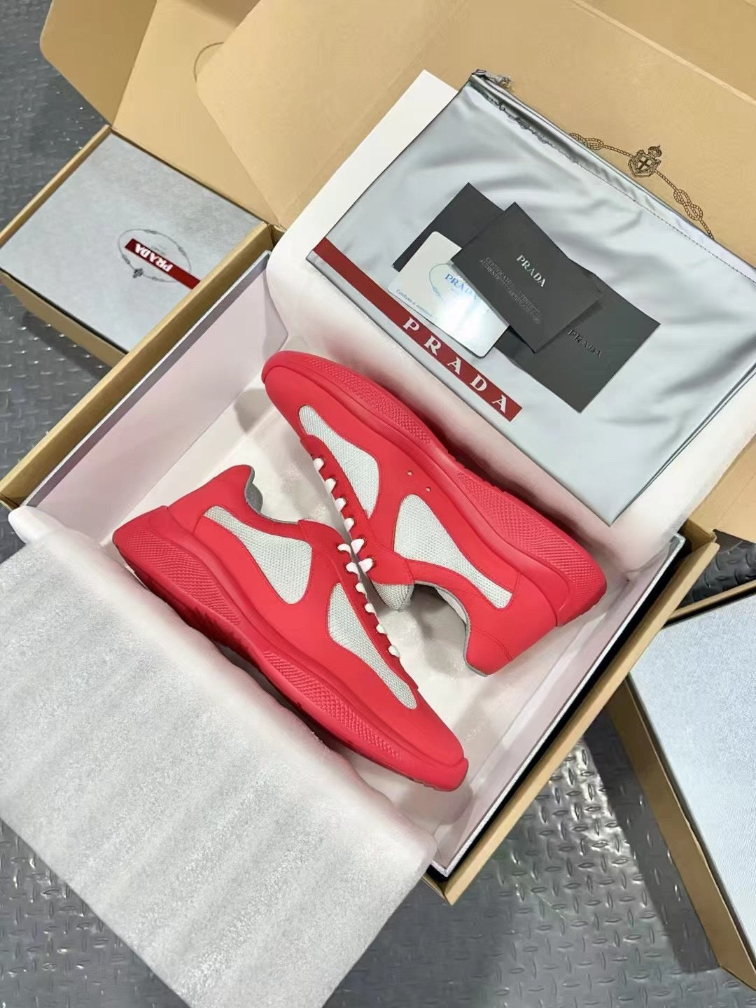 PRADA America's Cup red