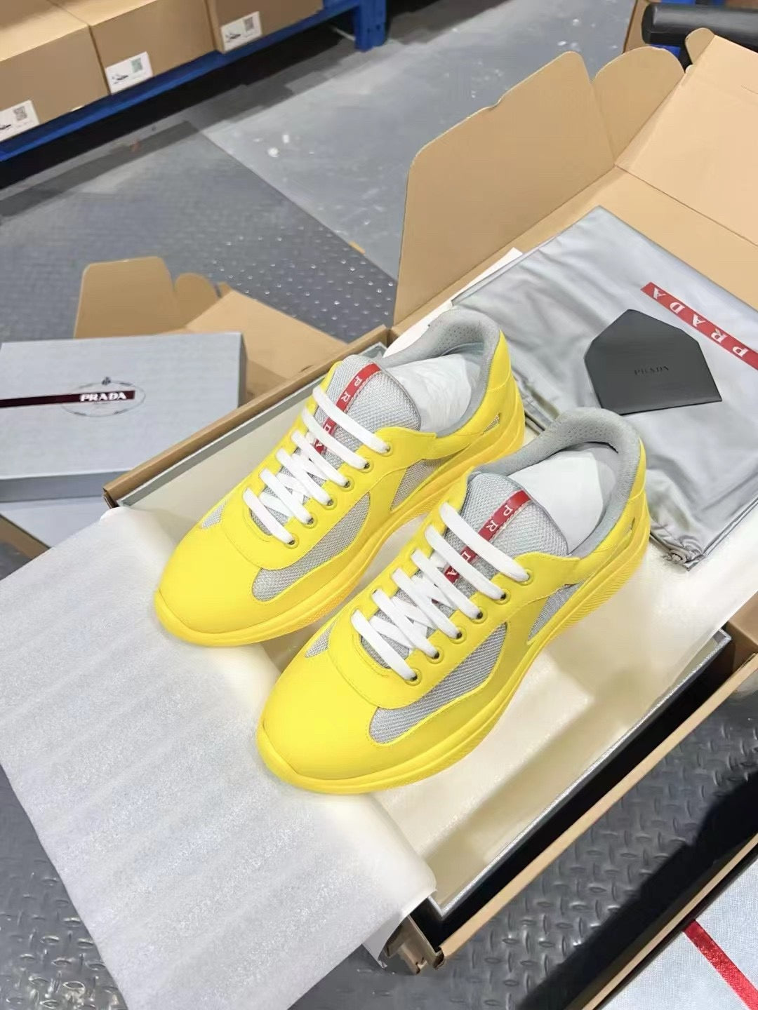 PRADA America's Cup yellow