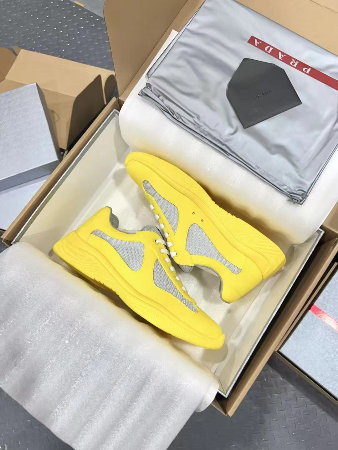 PRADA America's Cup yellow