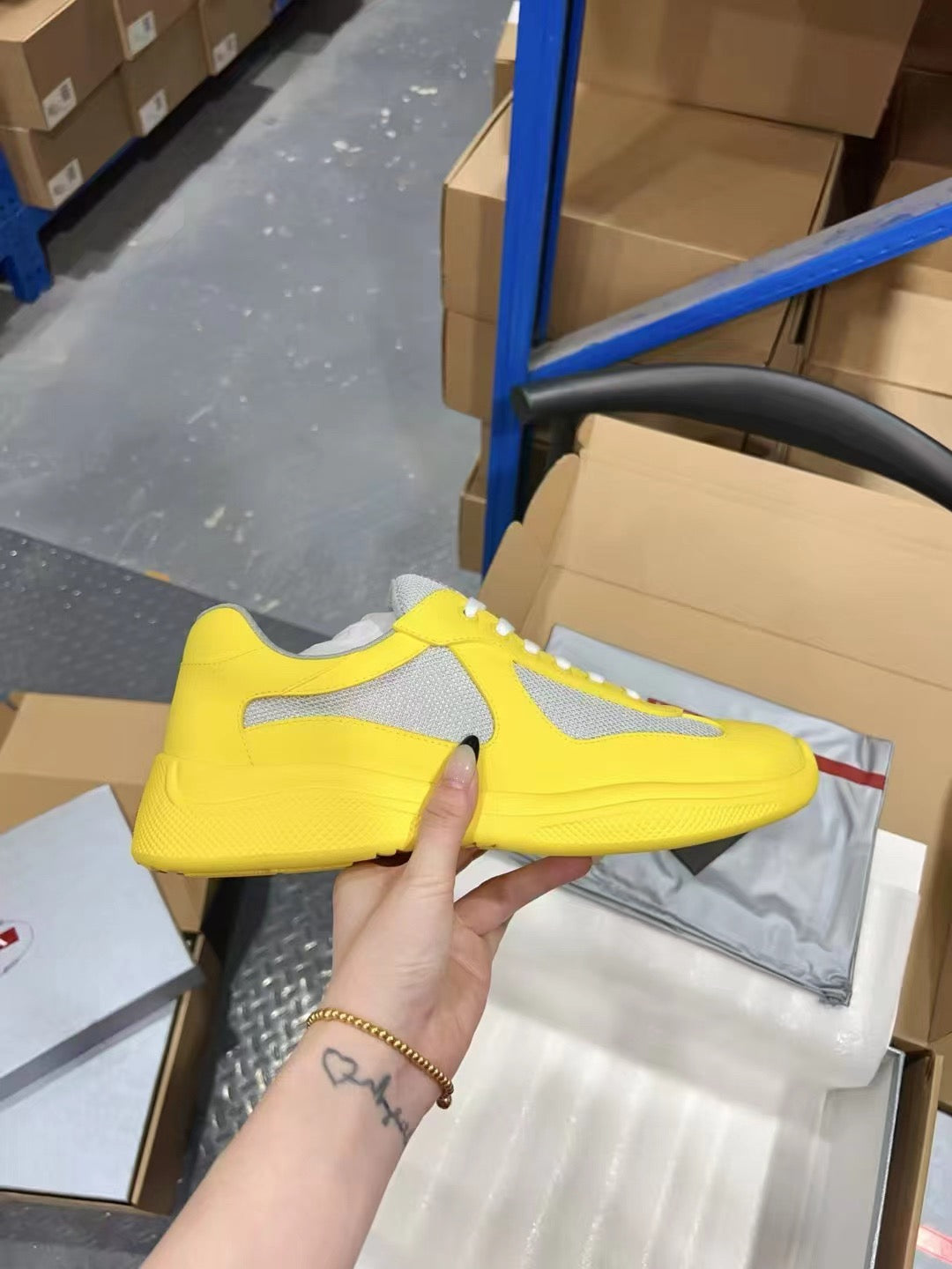 PRADA America's Cup yellow