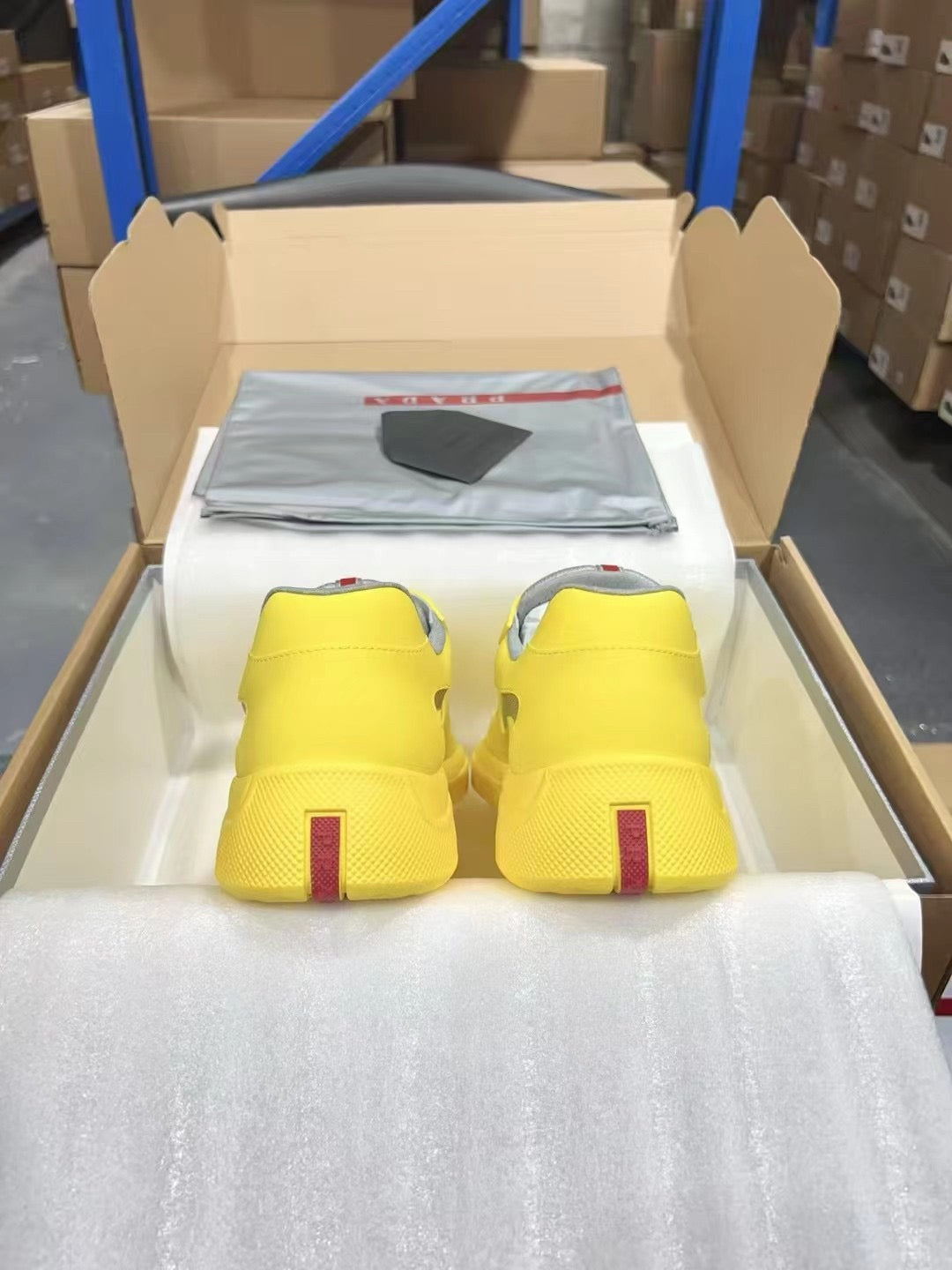 PRADA America's Cup yellow