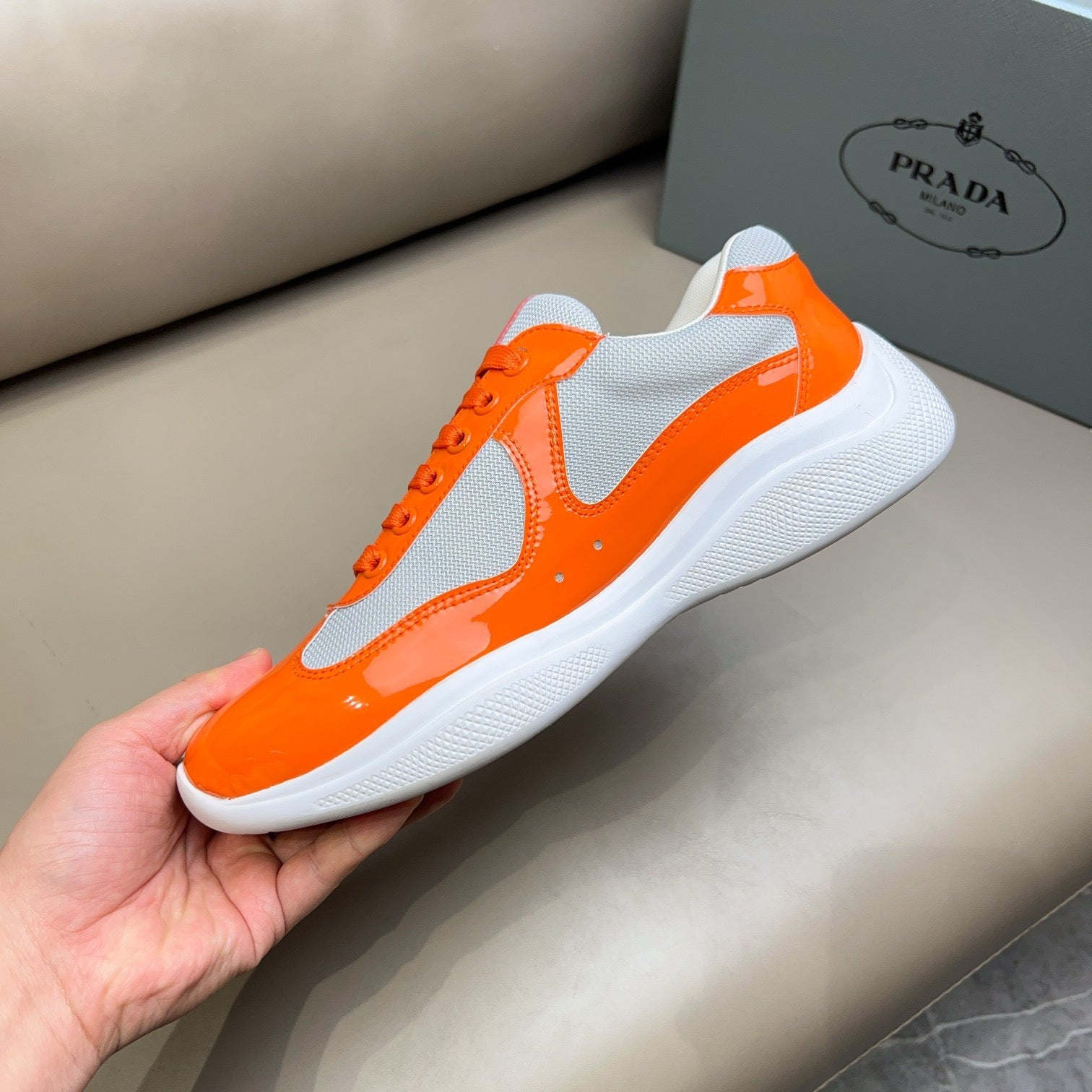 PRADA America's Cup orange