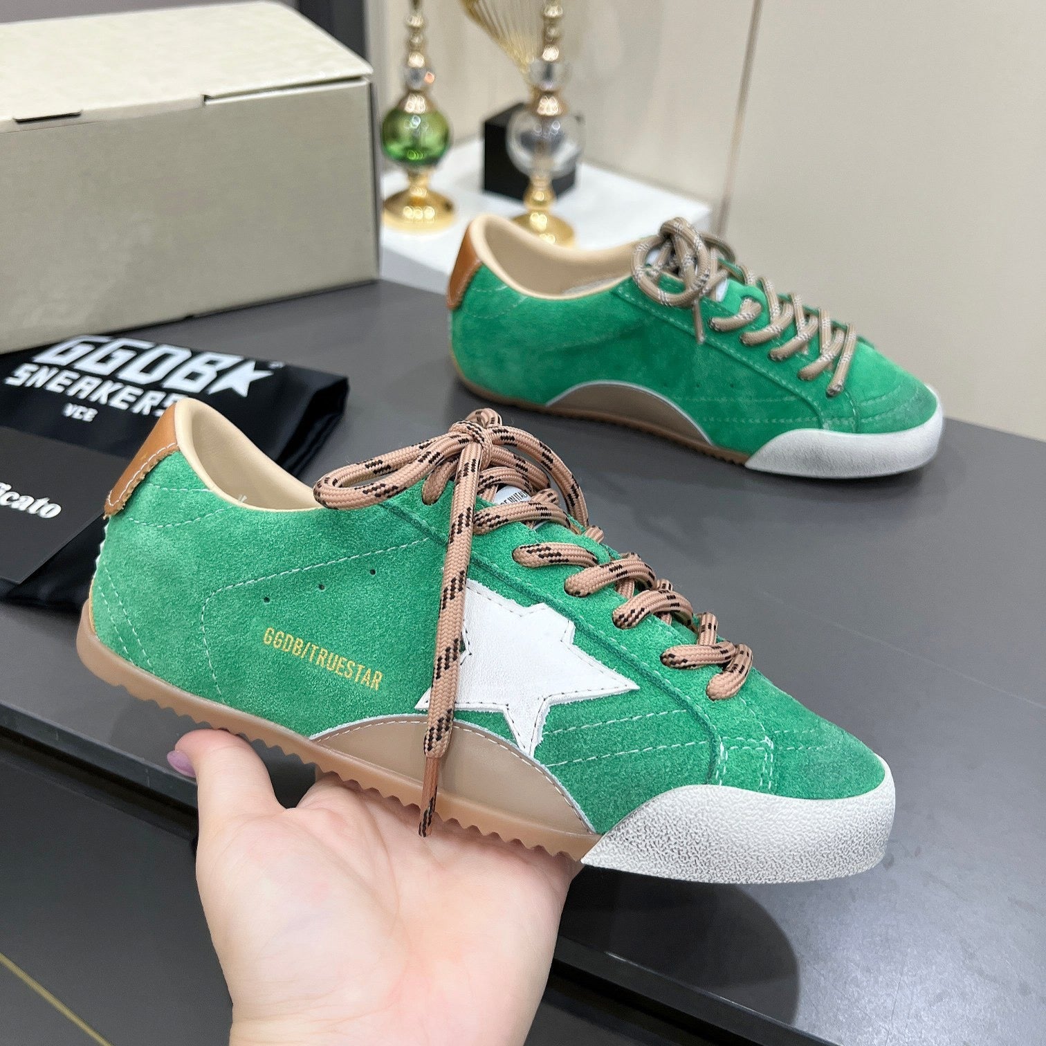 Golden Goose green background white star