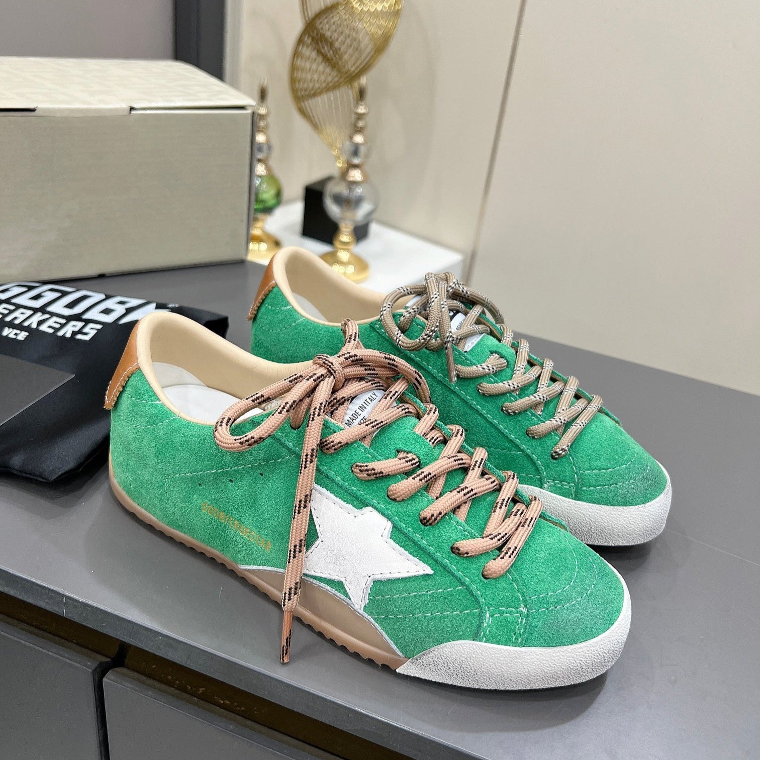 Golden Goose green background white star