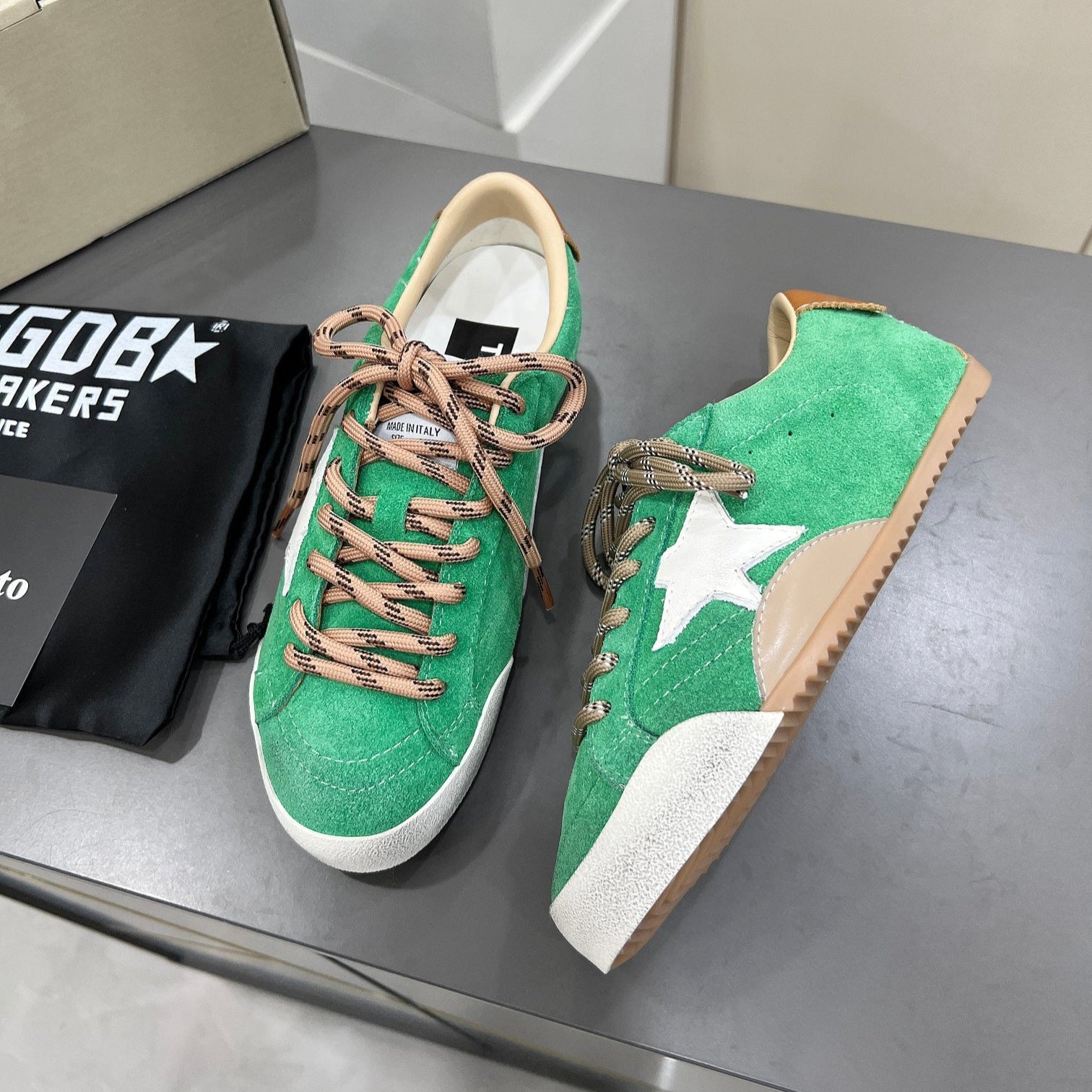 Golden Goose green background white star