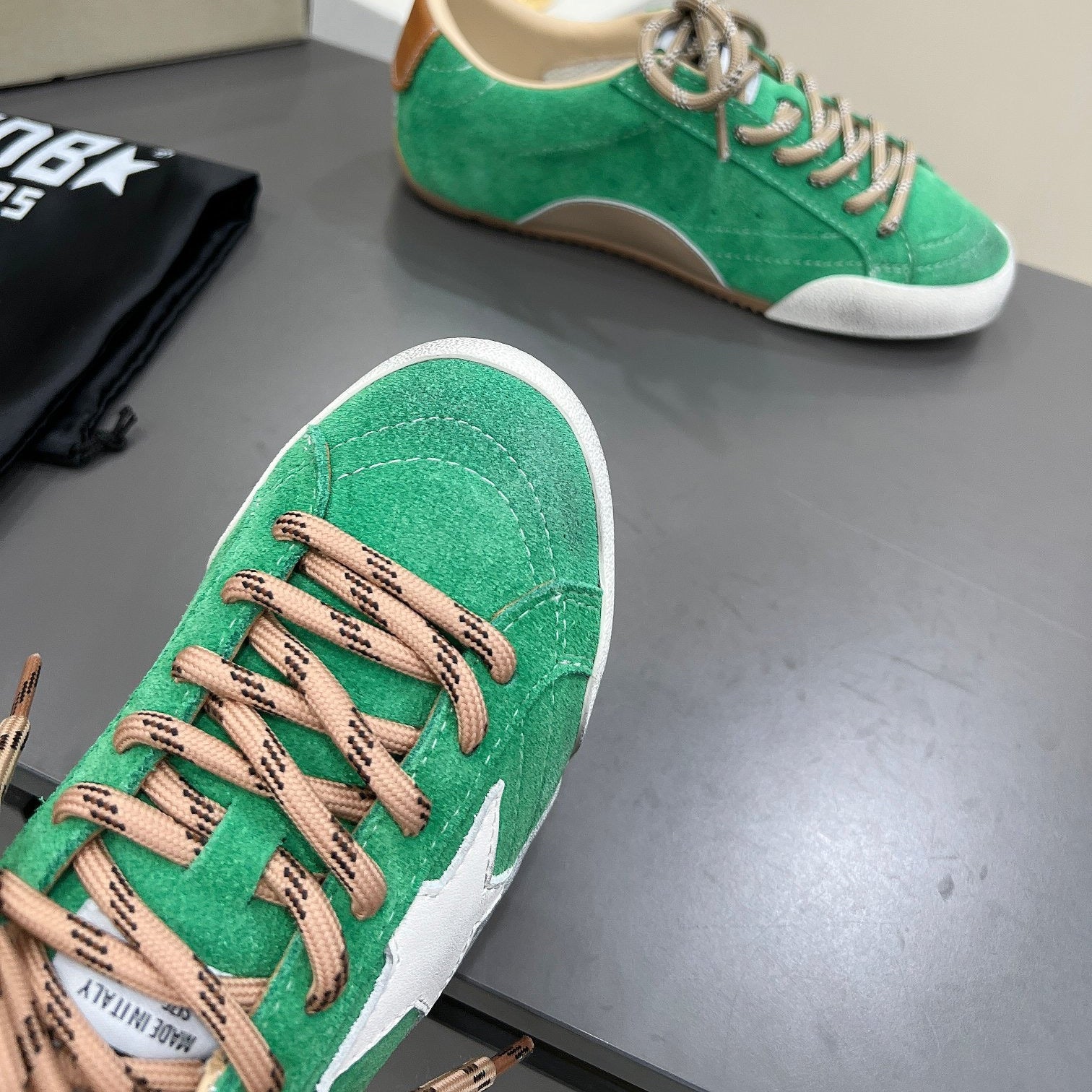 Golden Goose green background white star