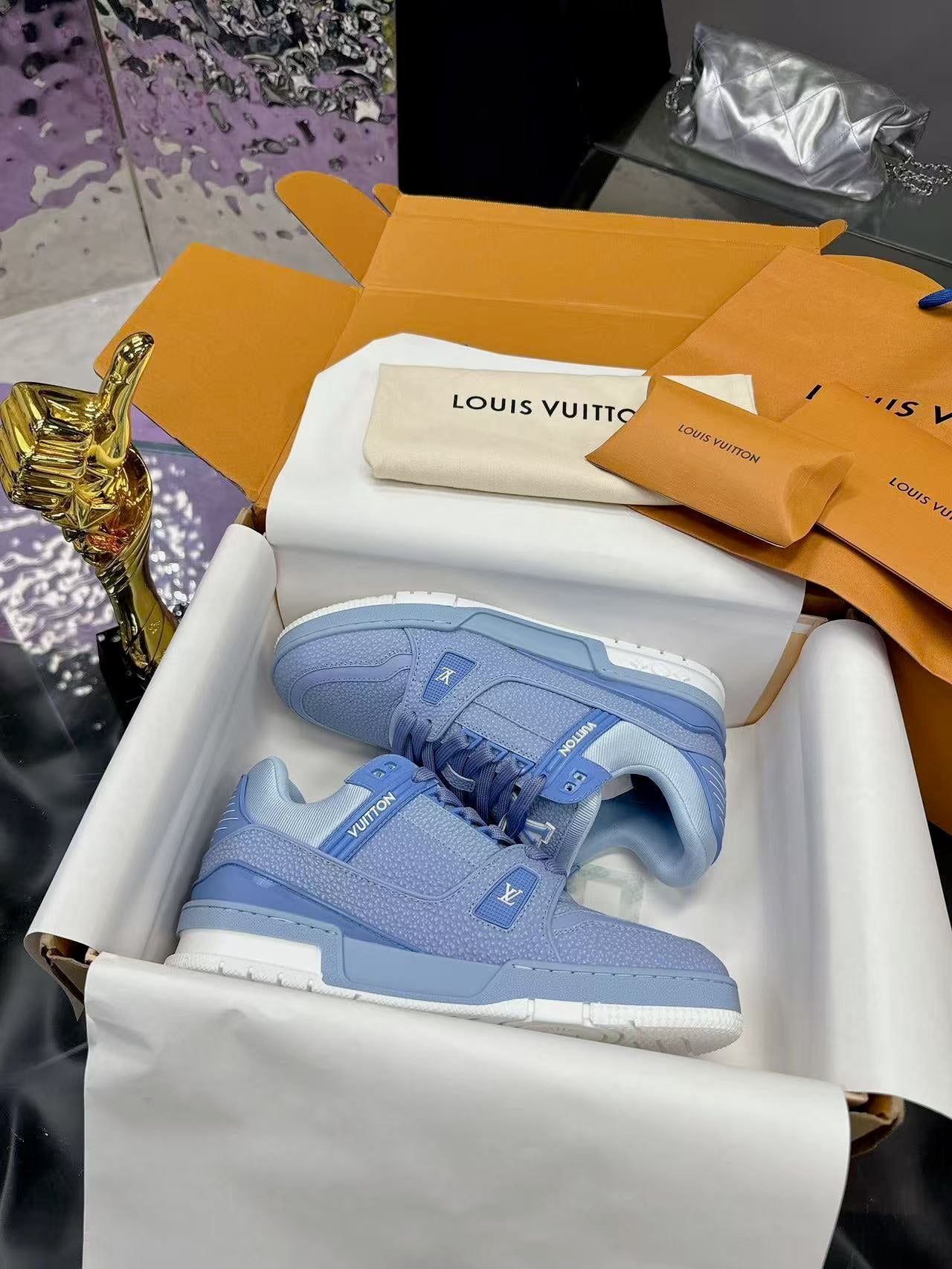 LV trainer light blue and white
