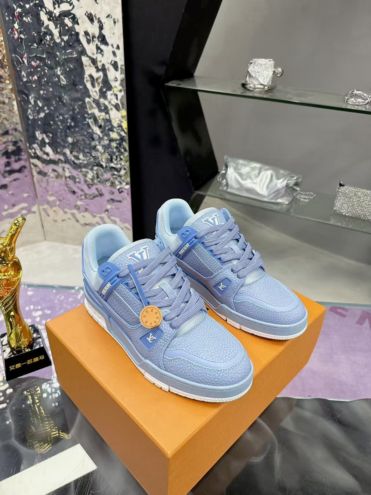 LV trainer light blue and white