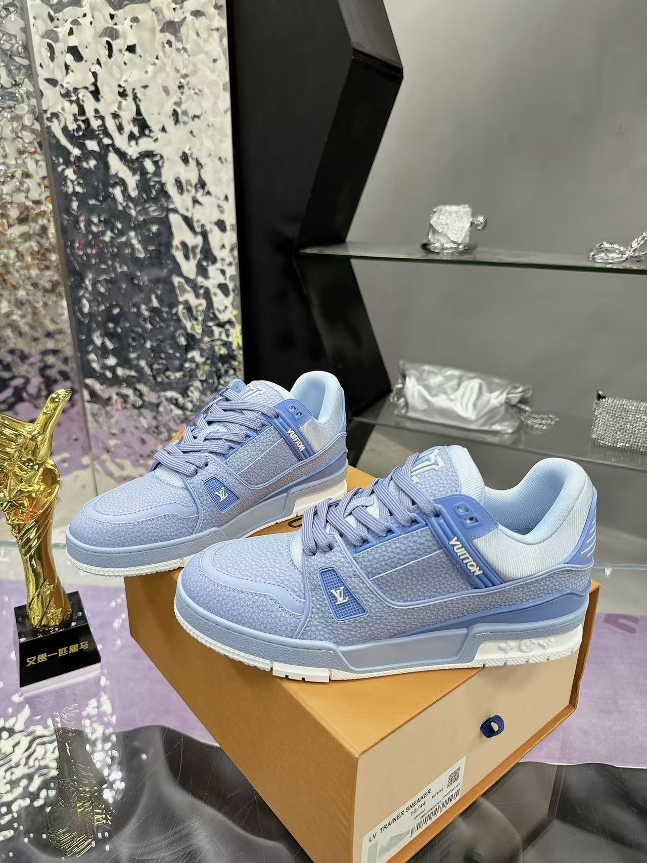 LV trainer light blue and white