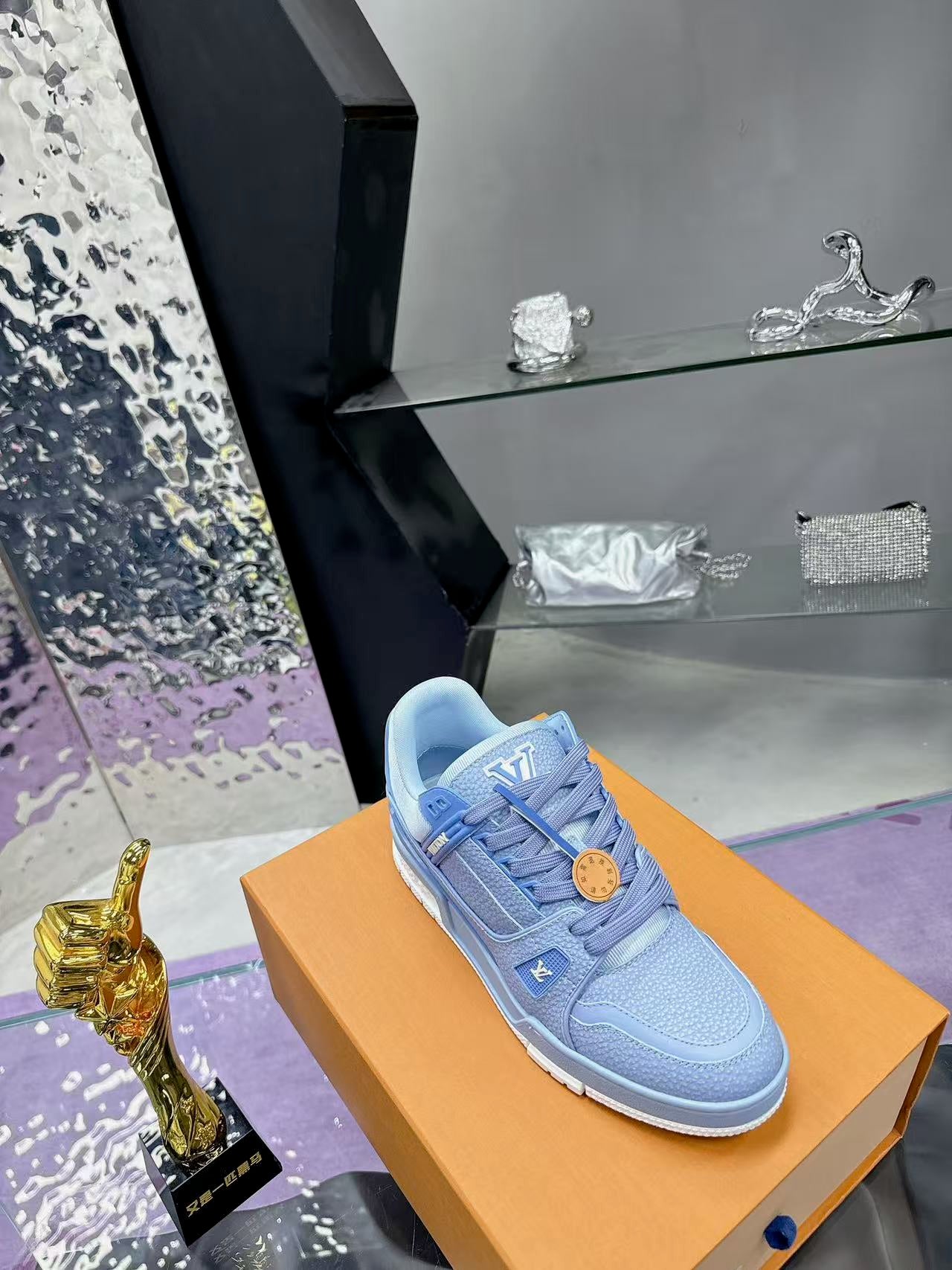 LV trainer light blue and white