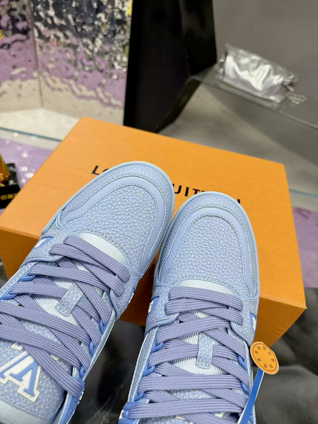 LV trainer light blue and white