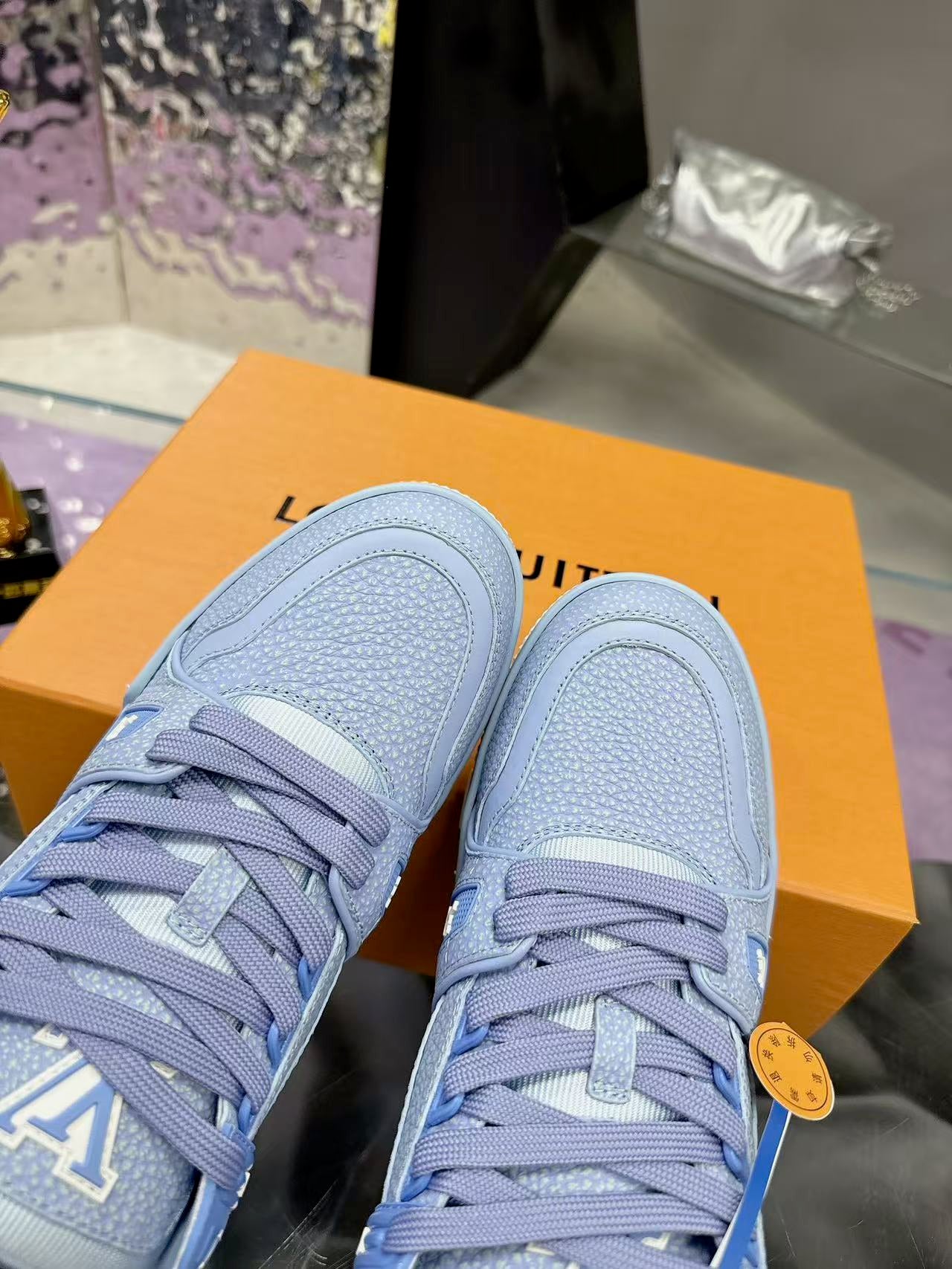 LV trainer light blue and white