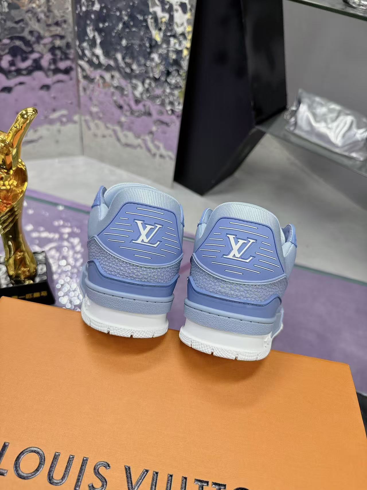 LV trainer light blue and white