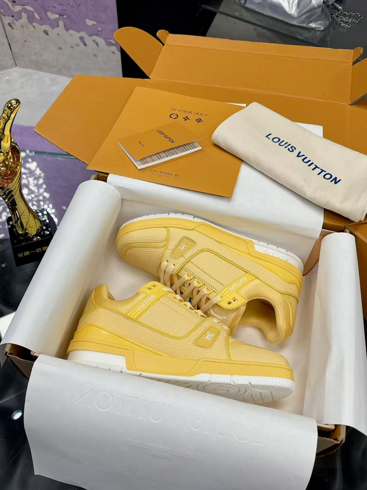 LV trainer yellow and white
