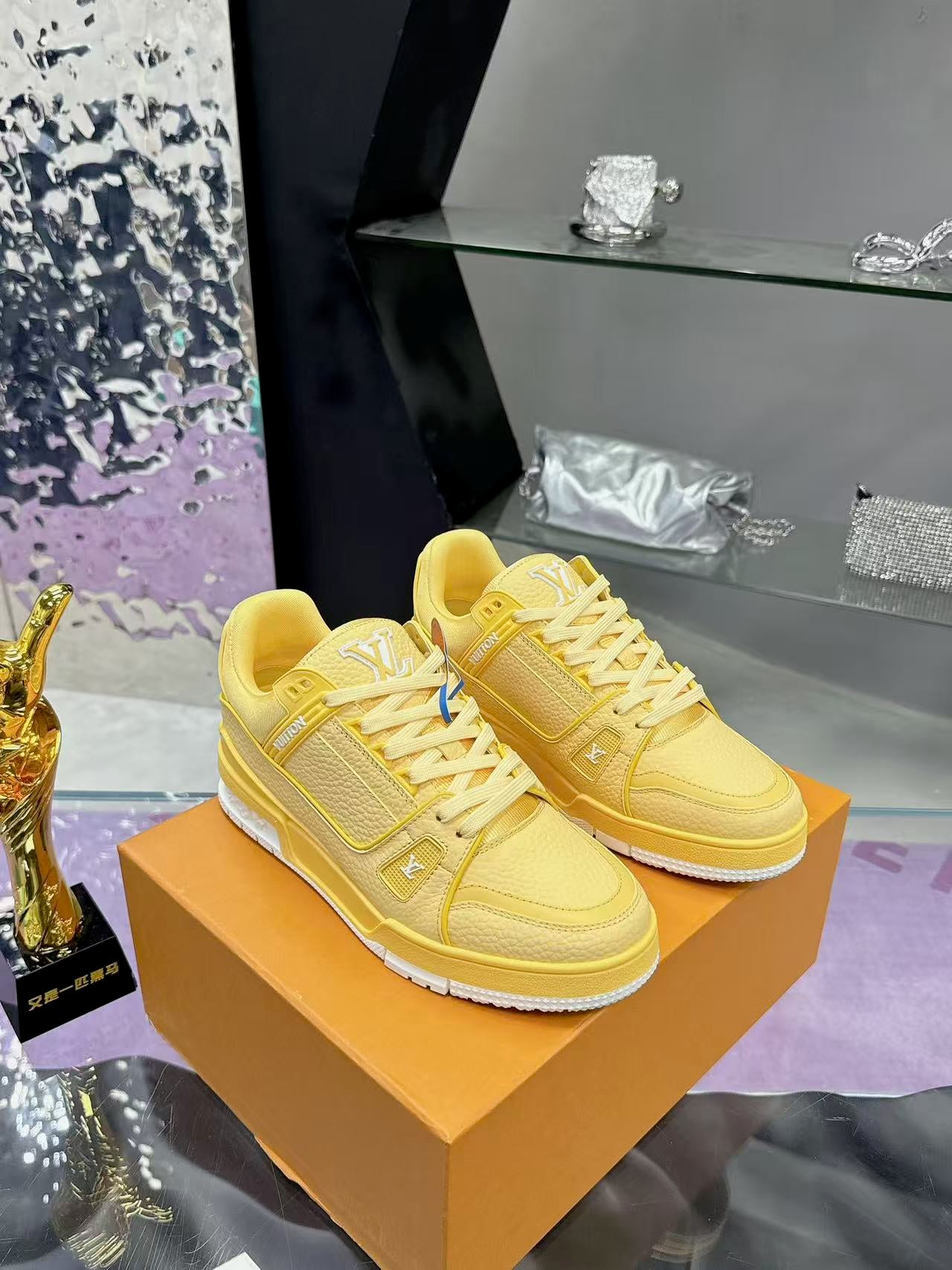 LV trainer yellow and white