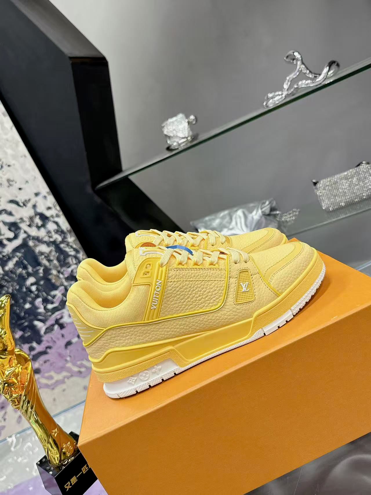 LV trainer yellow and white