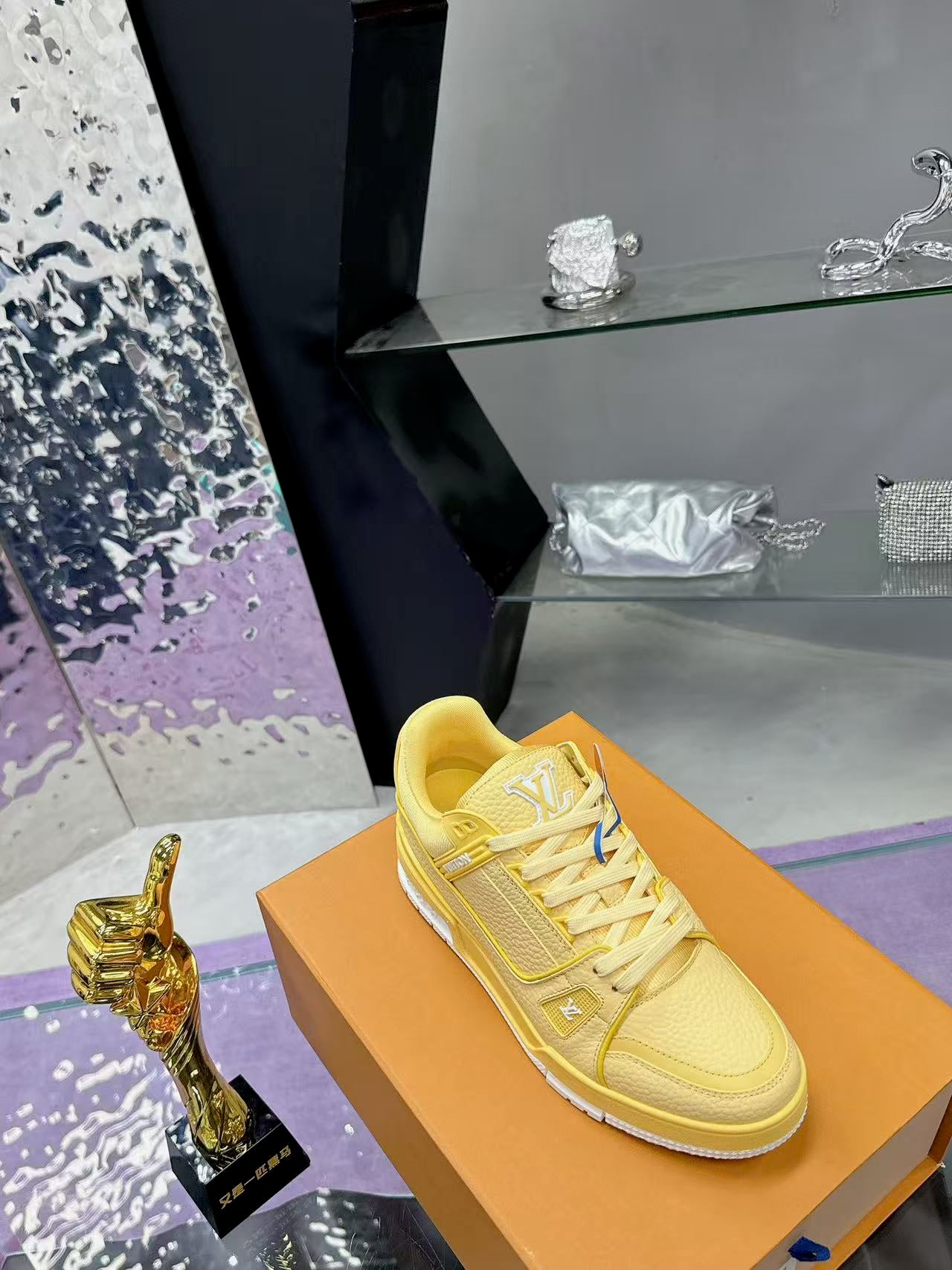 LV trainer yellow and white