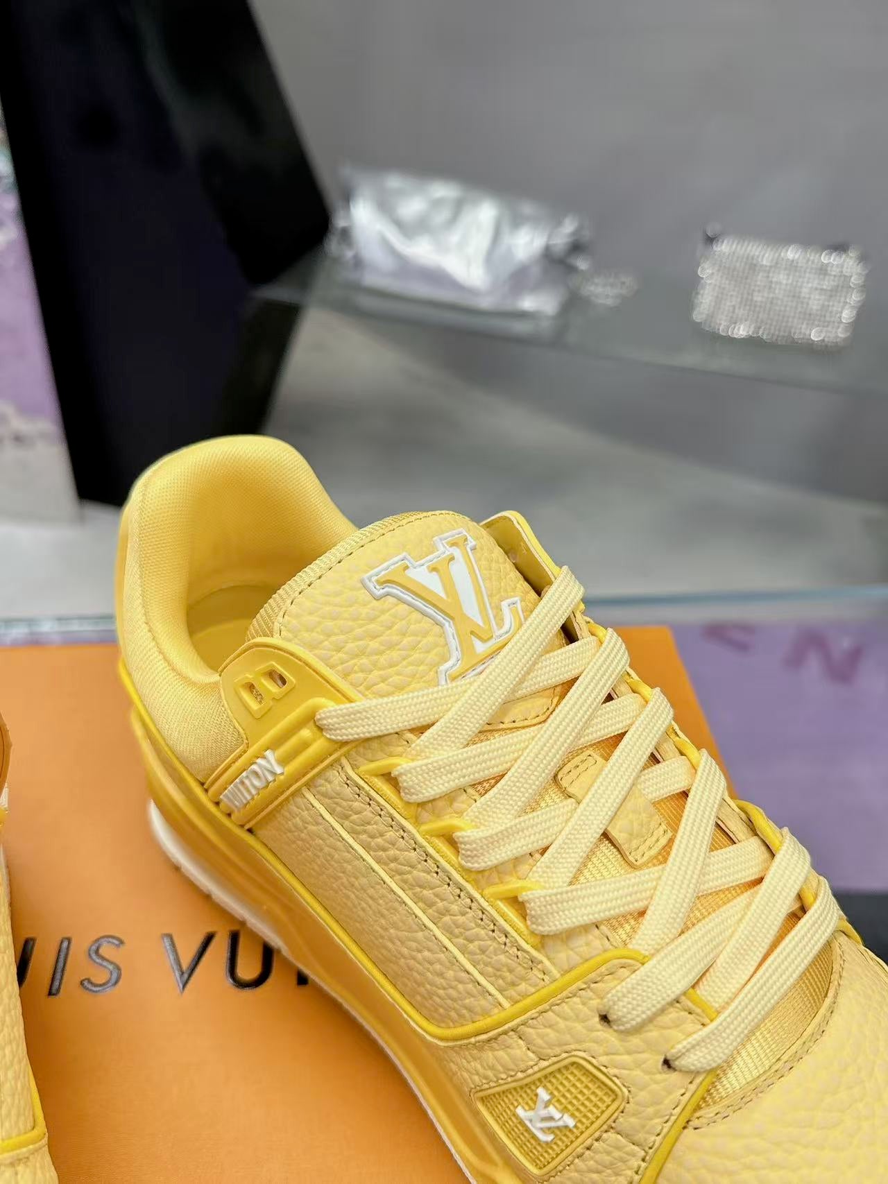 LV trainer yellow and white