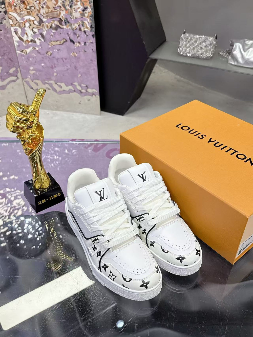 LV trainer white and black print
