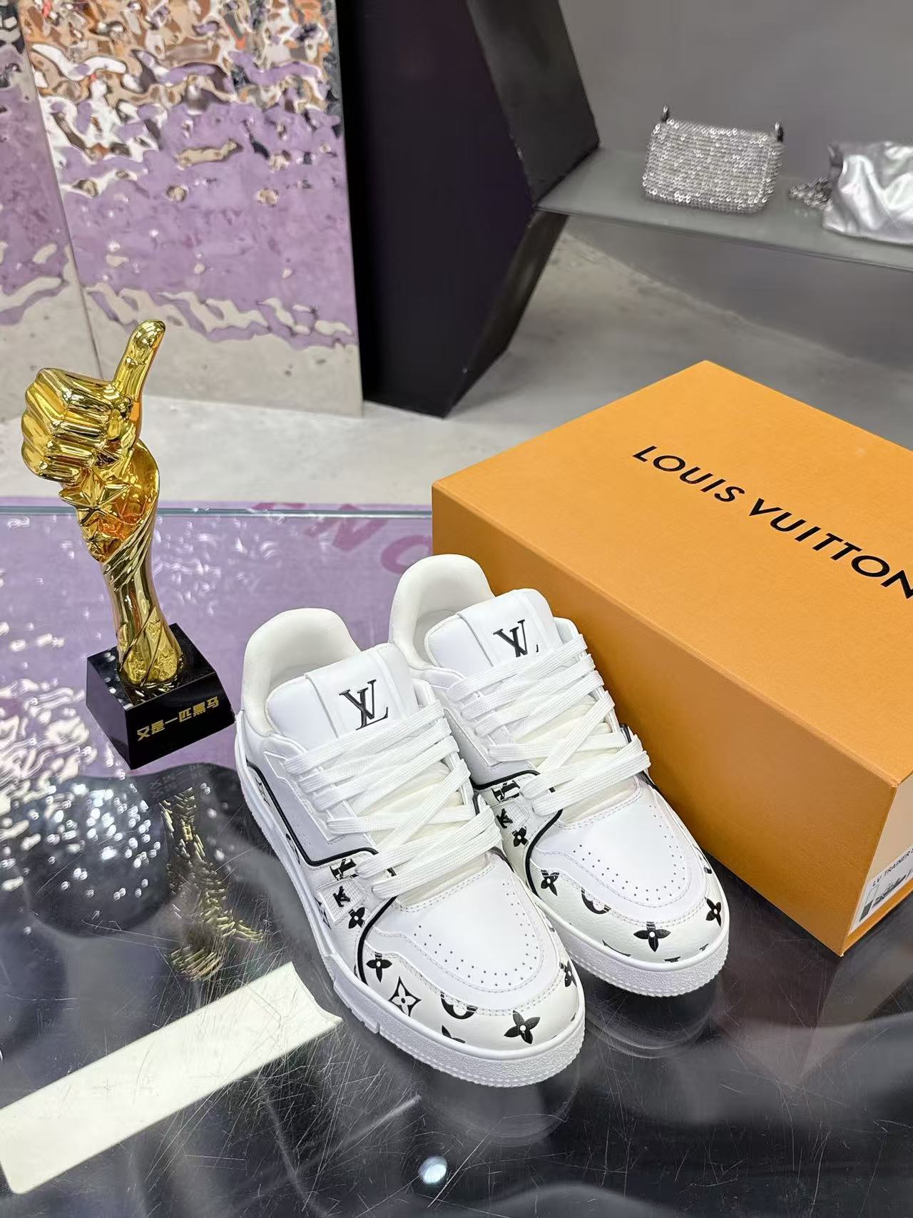 LV trainer white and black print
