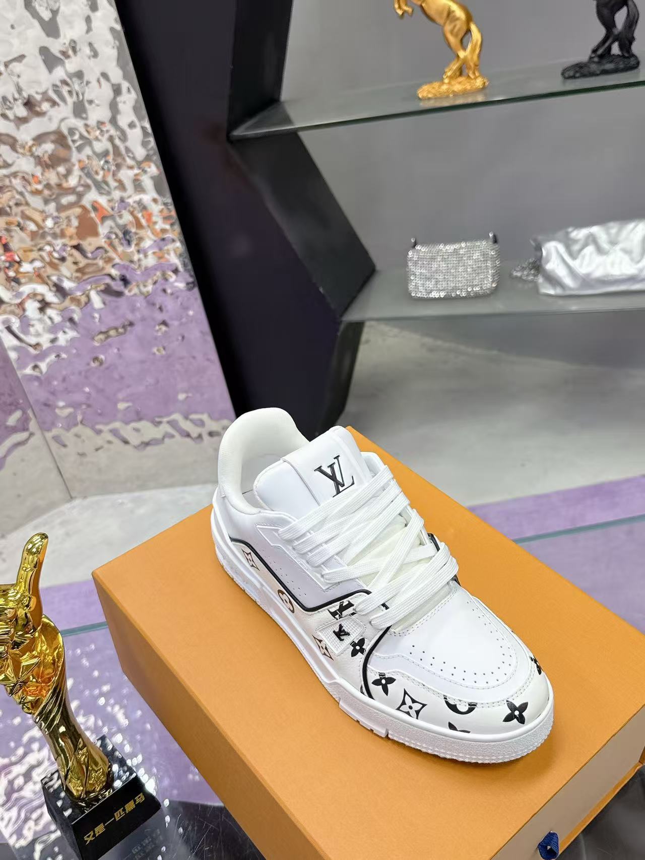 LV trainer white and black print