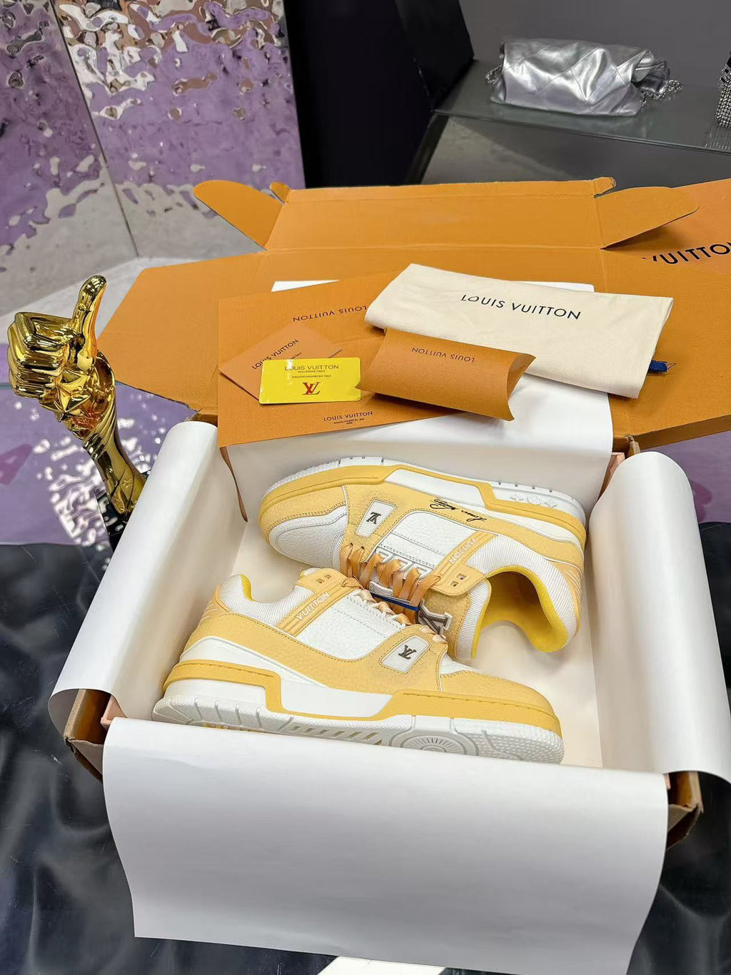 LV trainer yellow and white calfskin
