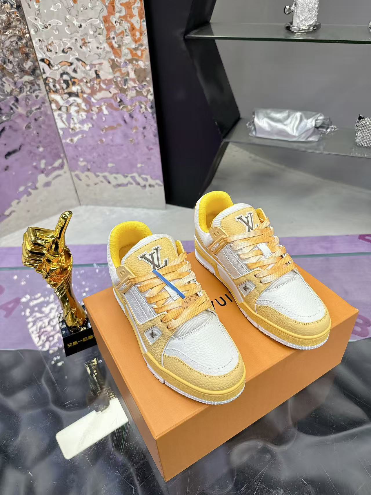 LV trainer yellow and white calfskin