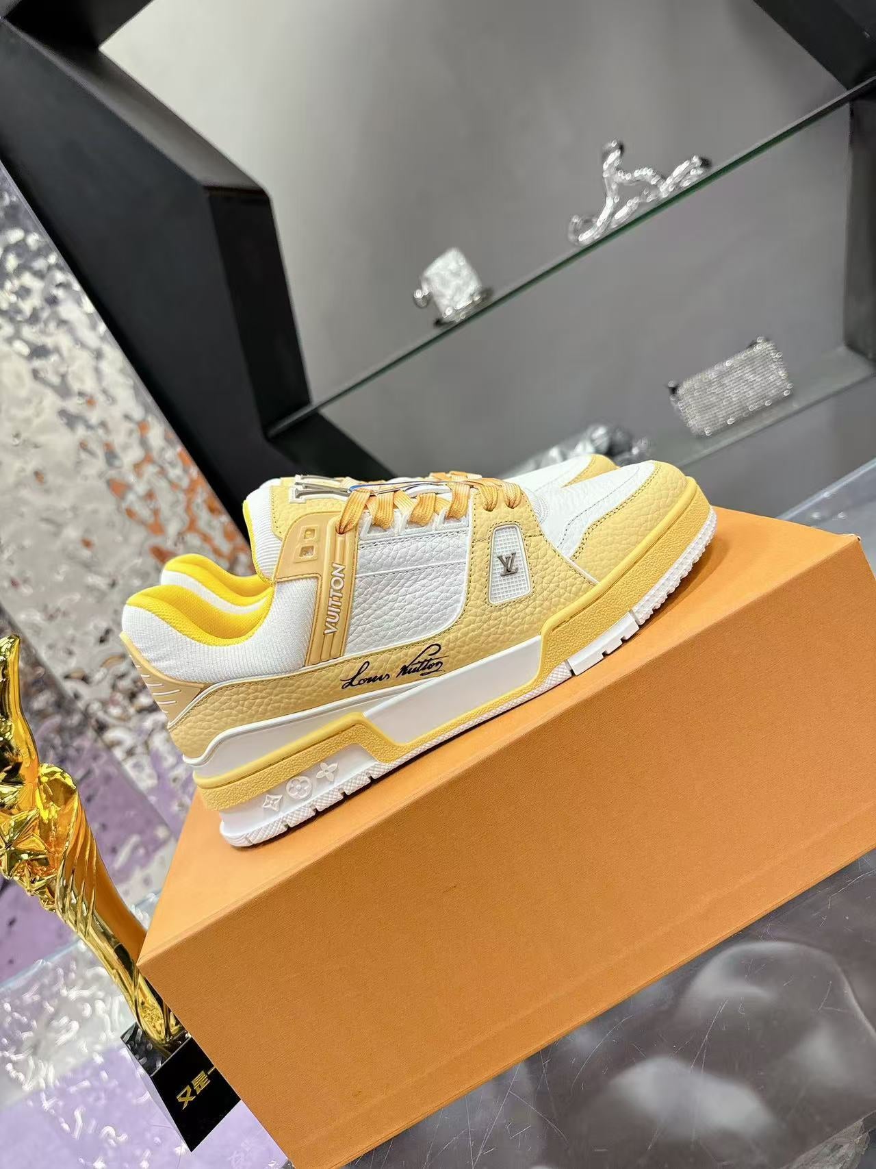 LV trainer yellow and white calfskin