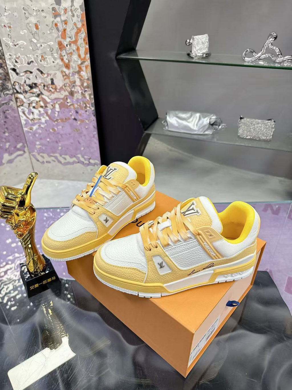 LV trainer yellow and white calfskin