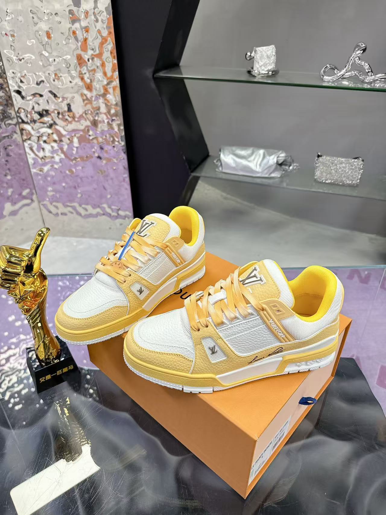 LV trainer yellow and white calfskin