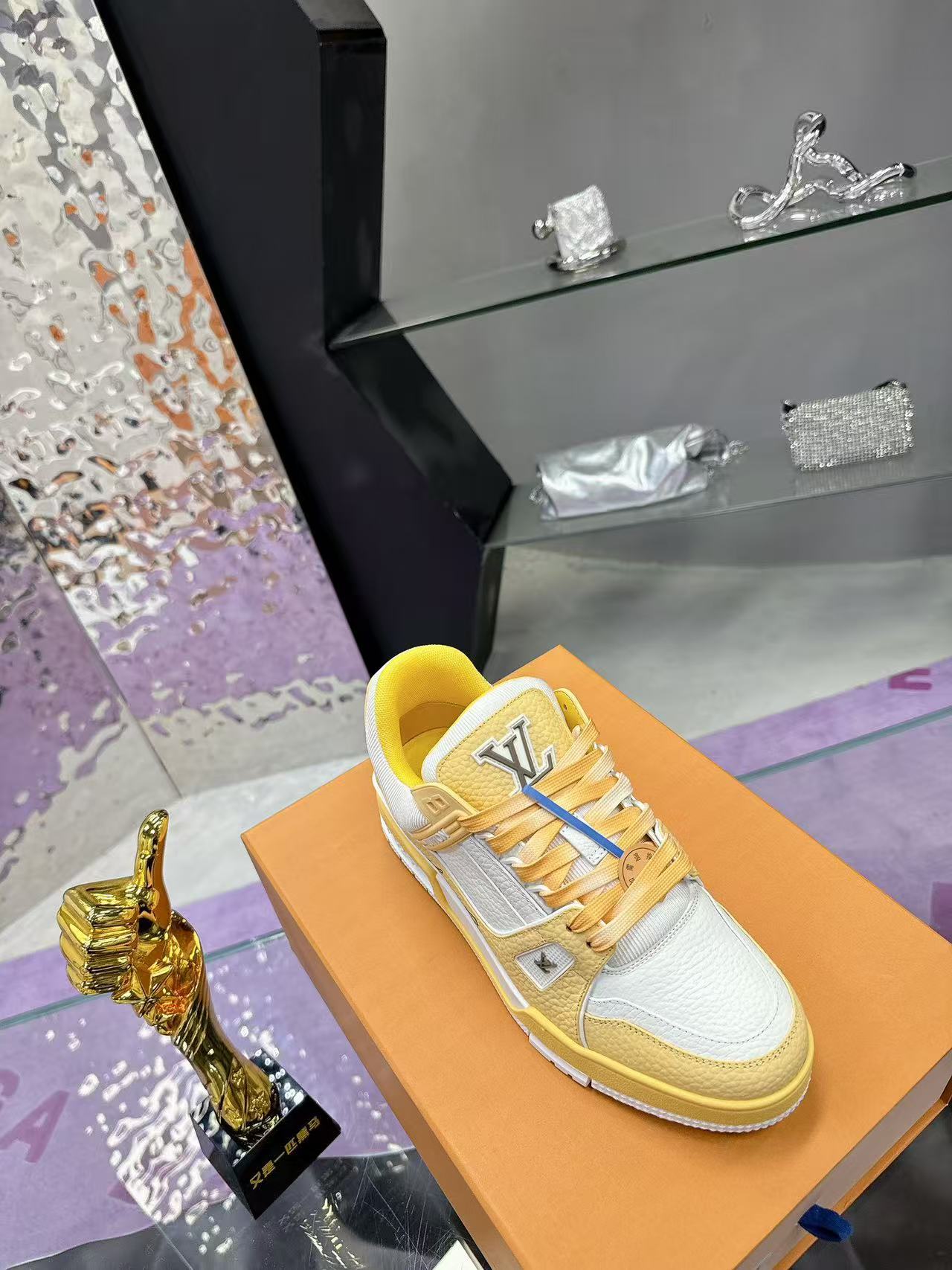 LV trainer yellow and white calfskin