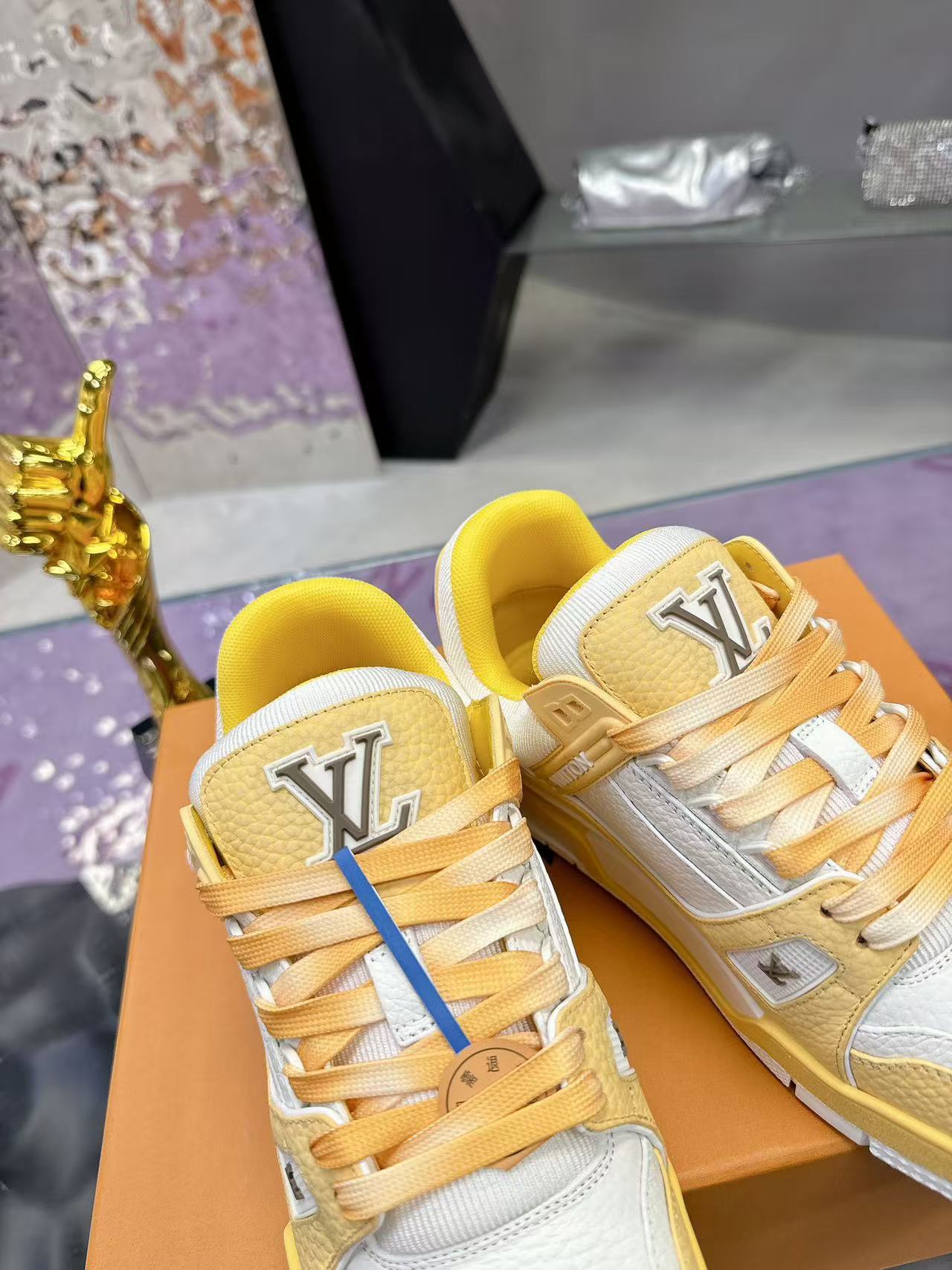 LV trainer yellow and white calfskin