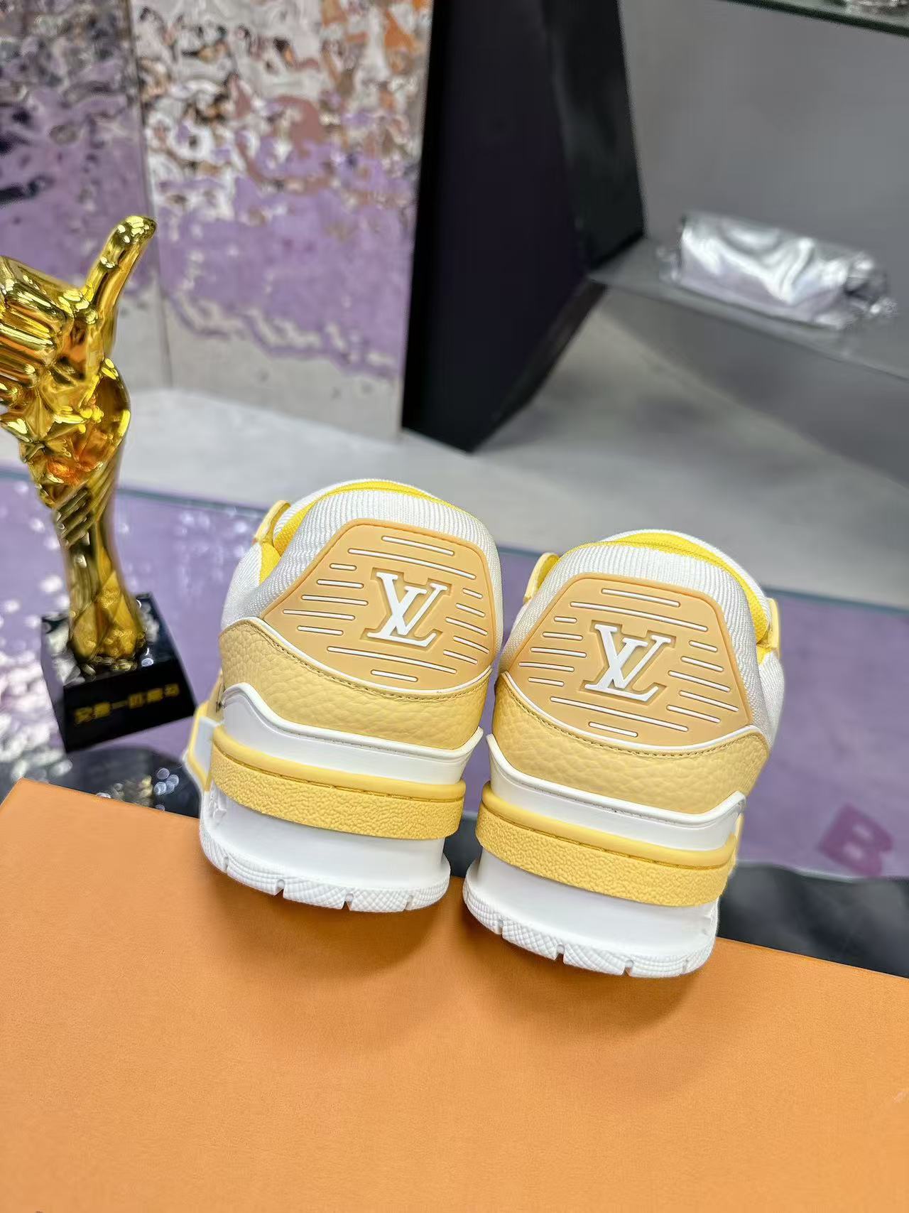 LV trainer yellow and white calfskin
