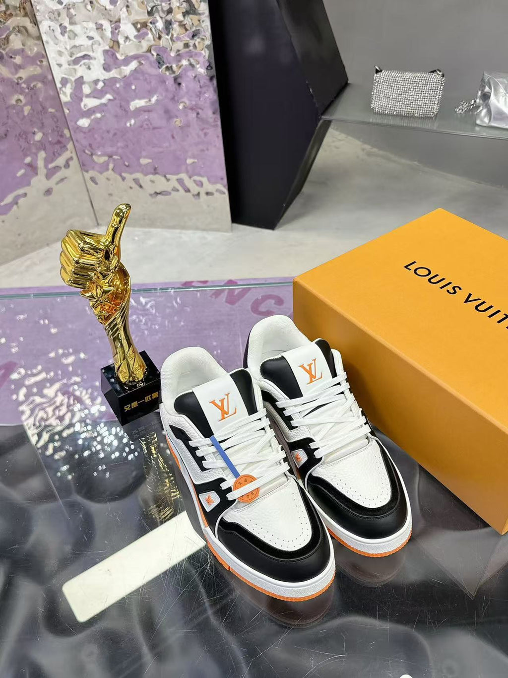 LV trainer orange, white and black
