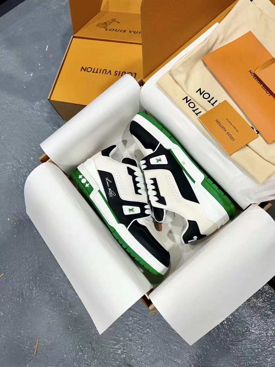 LV trainer green, white and black