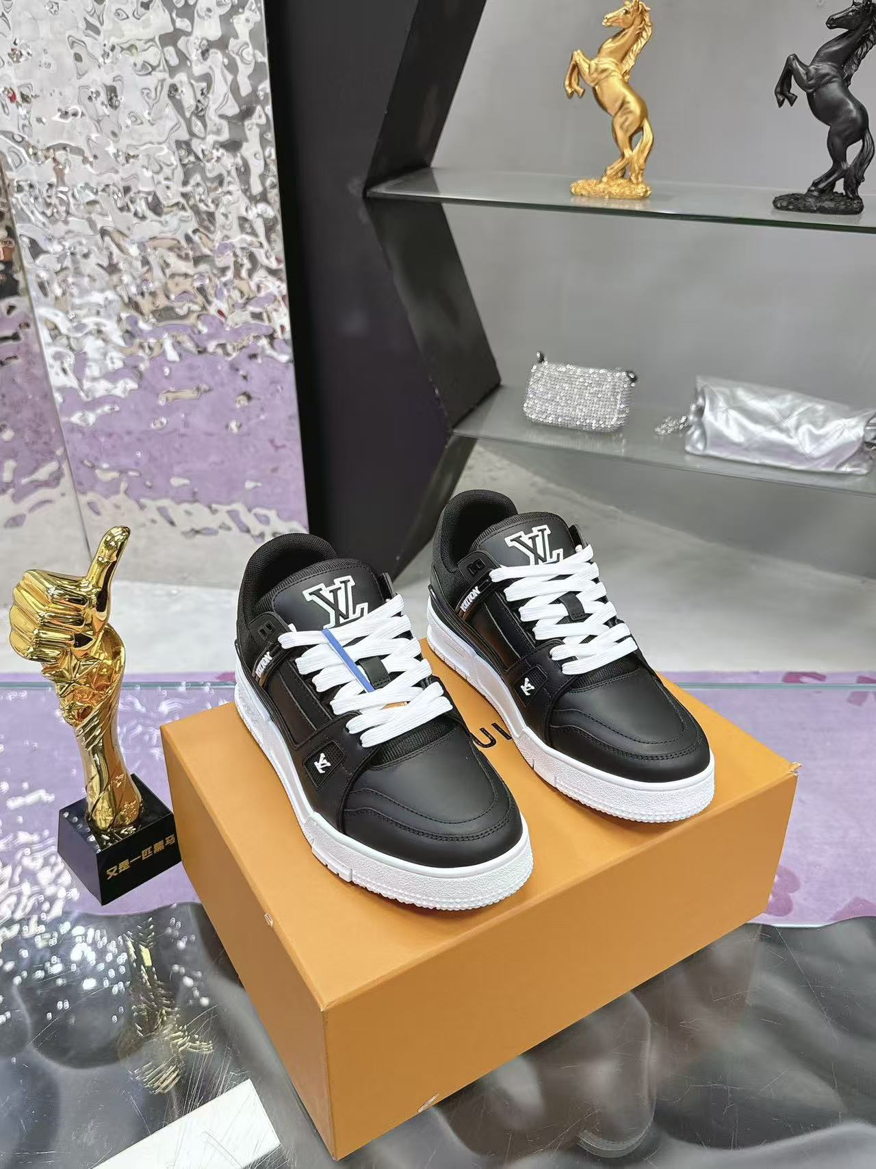 LV trainer black with white background
