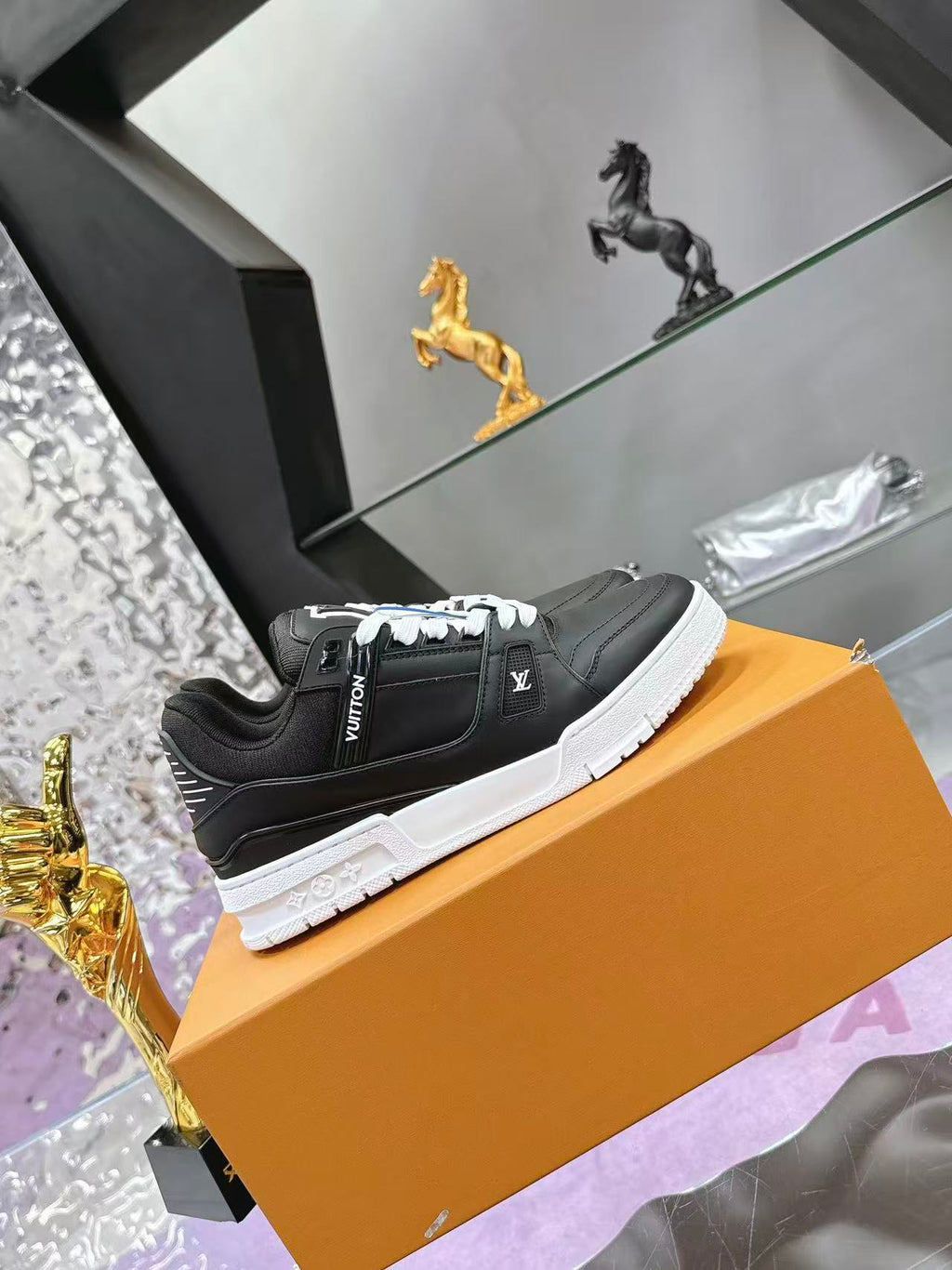 LV trainer black with white background