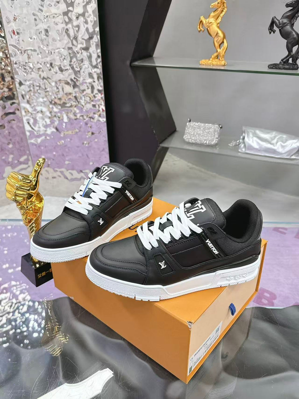 LV trainer black with white background