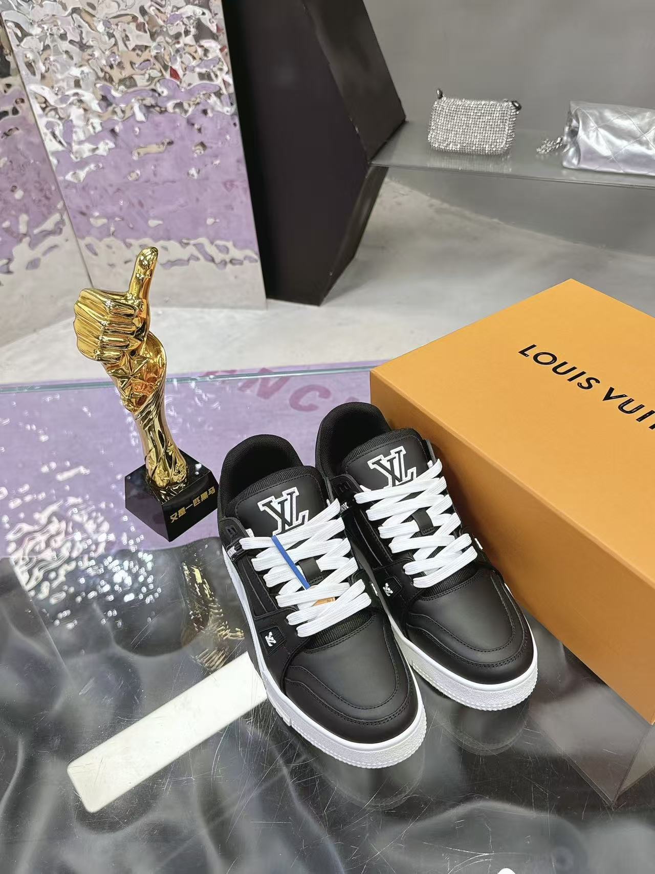 LV trainer black with white background