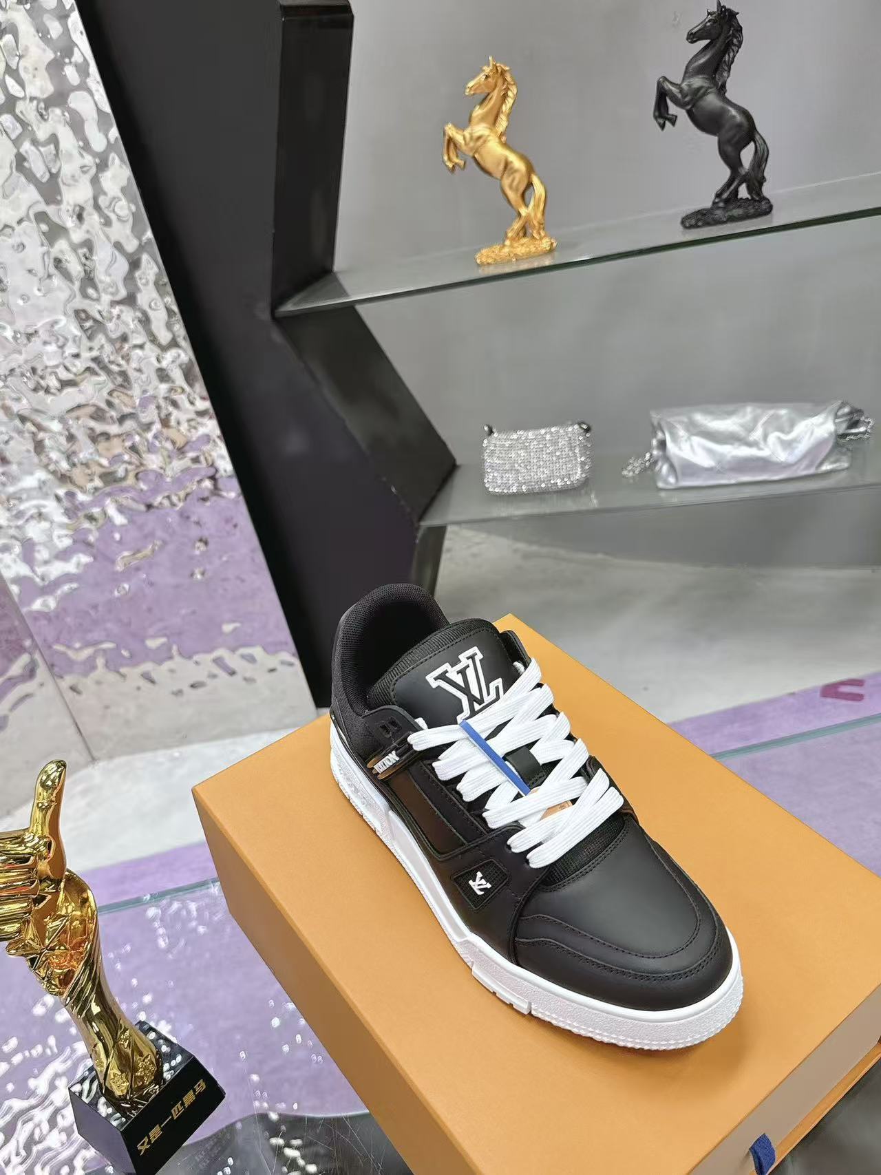 LV trainer black with white background