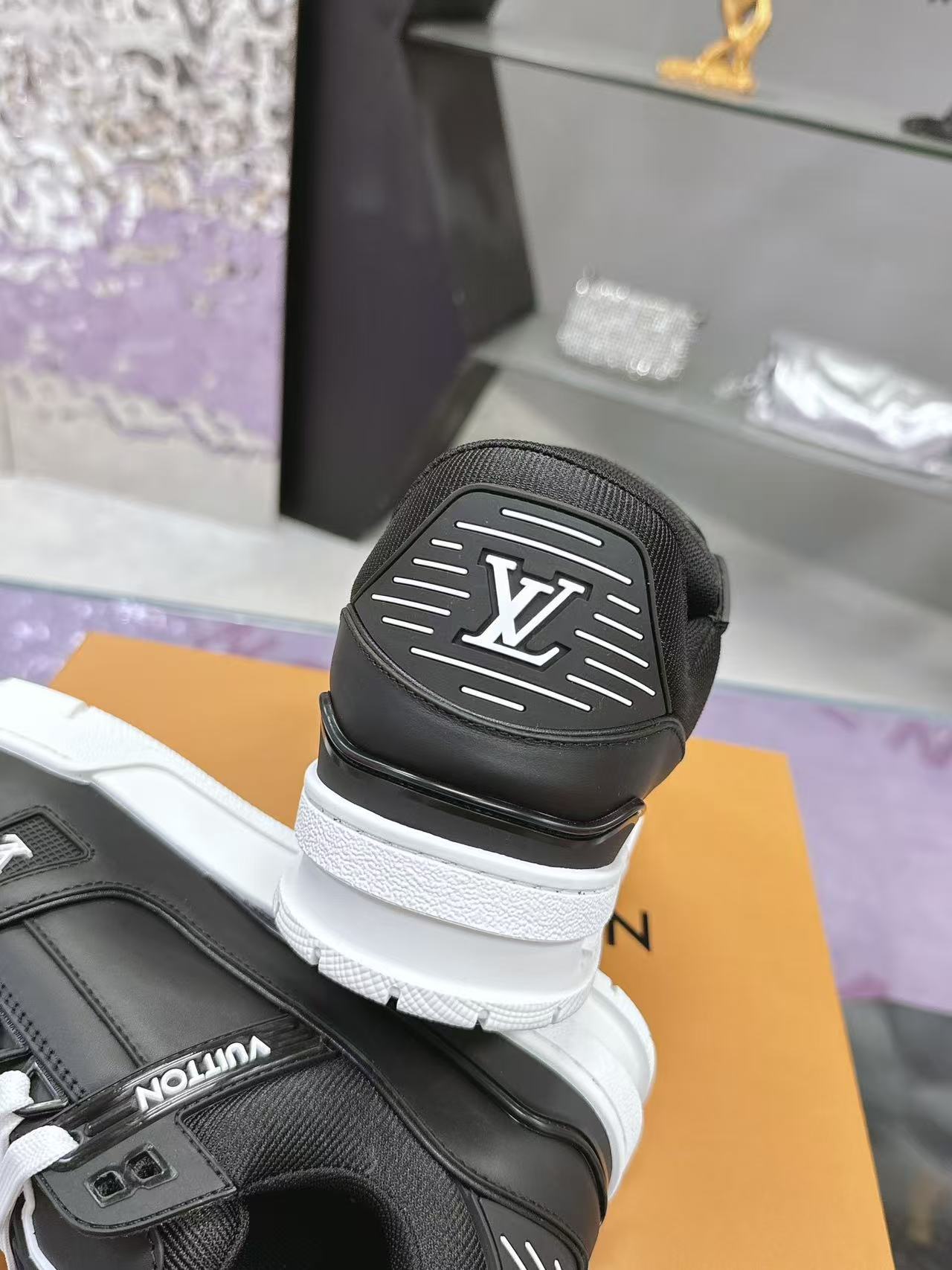 LV trainer black with white background