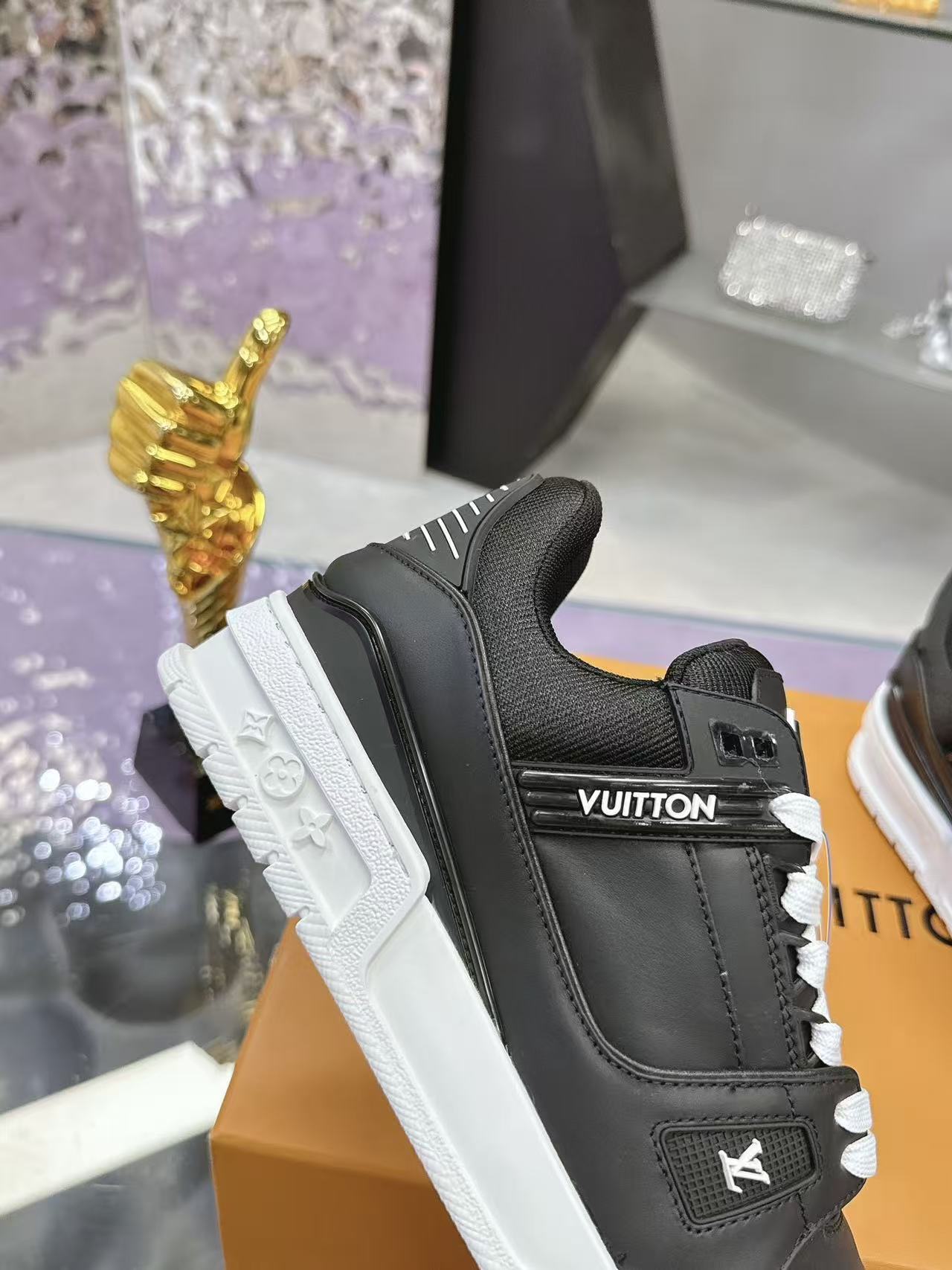 LV trainer black with white background