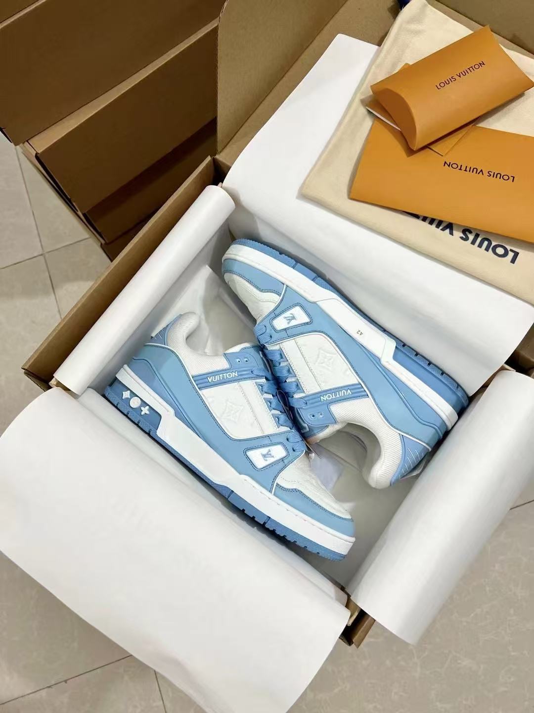 LV trainer white and blue