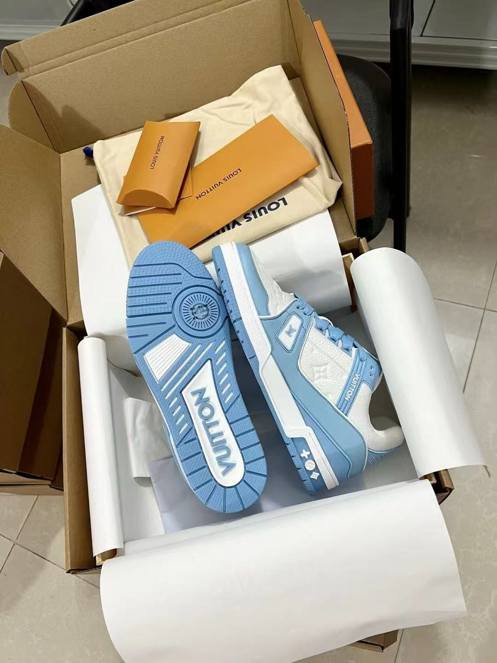 LV trainer white and blue