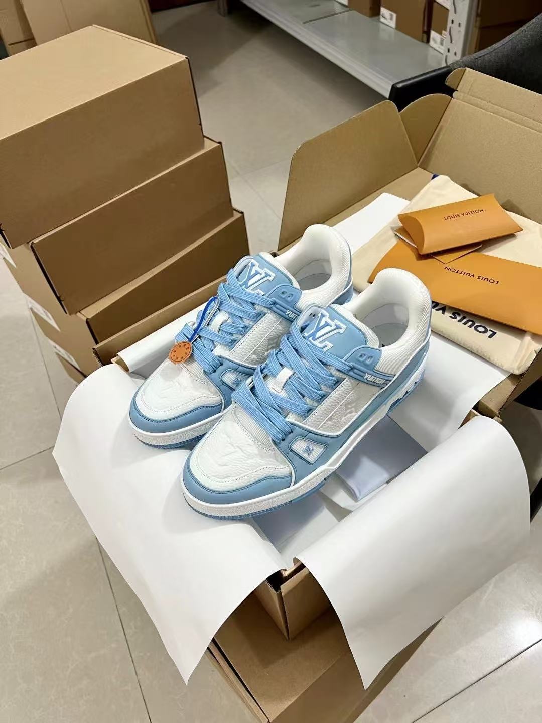 LV trainer white and blue