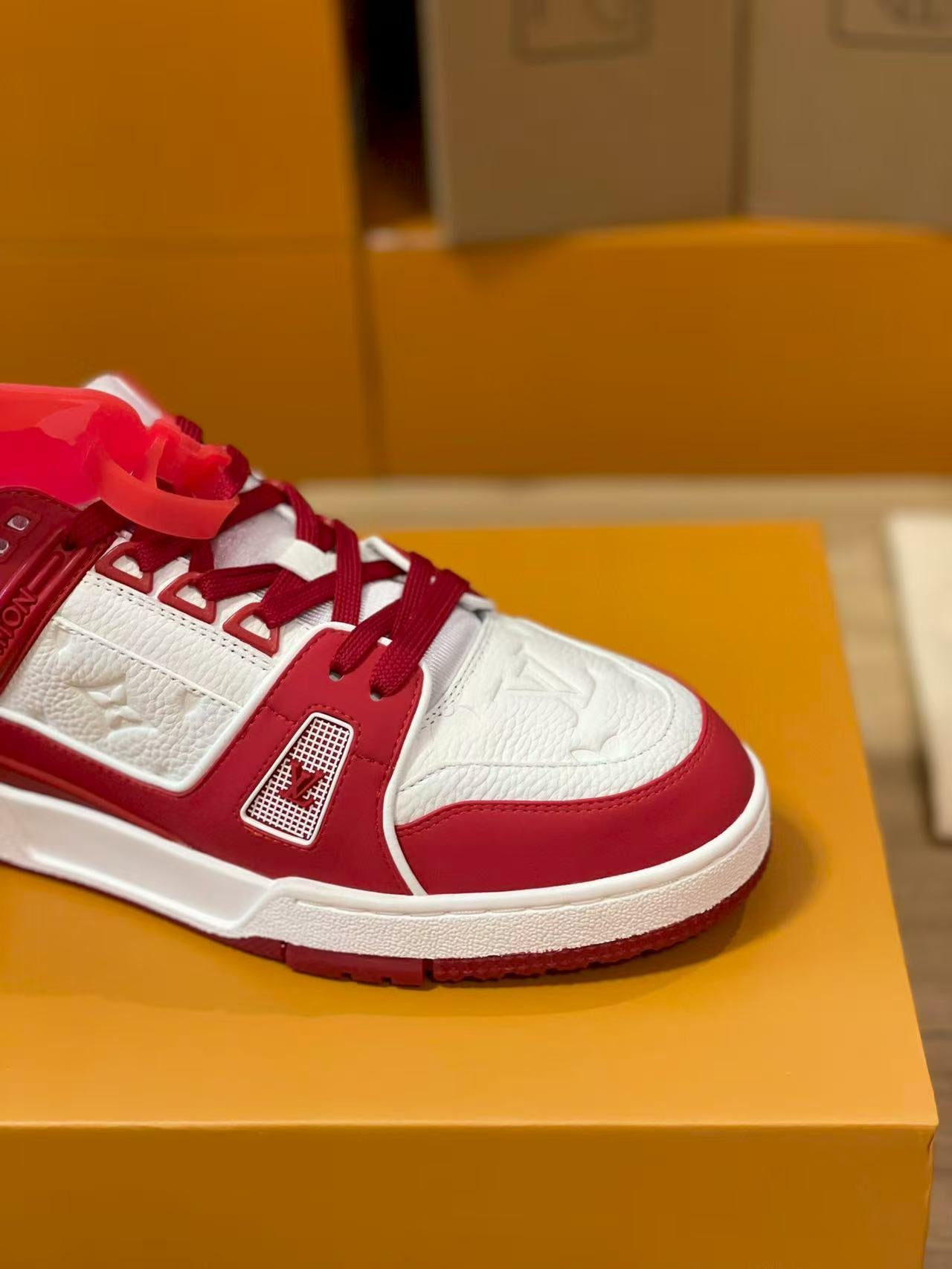 LV trainer red and white charity edition