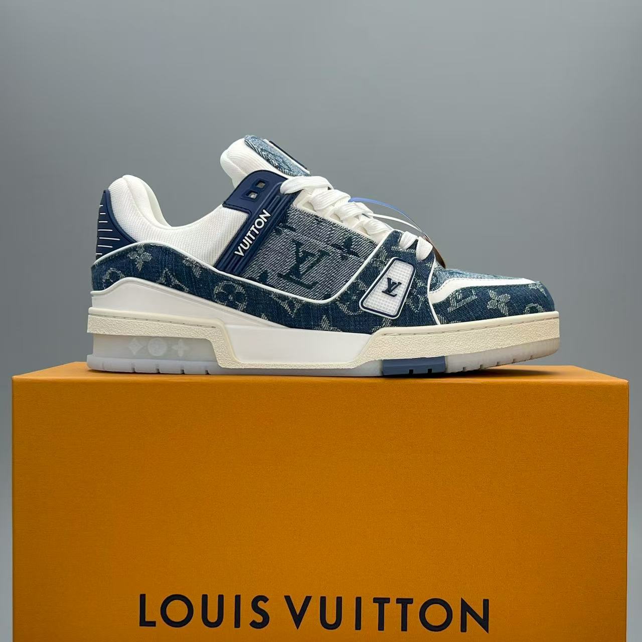 LV trainer blue denim crystal bottom