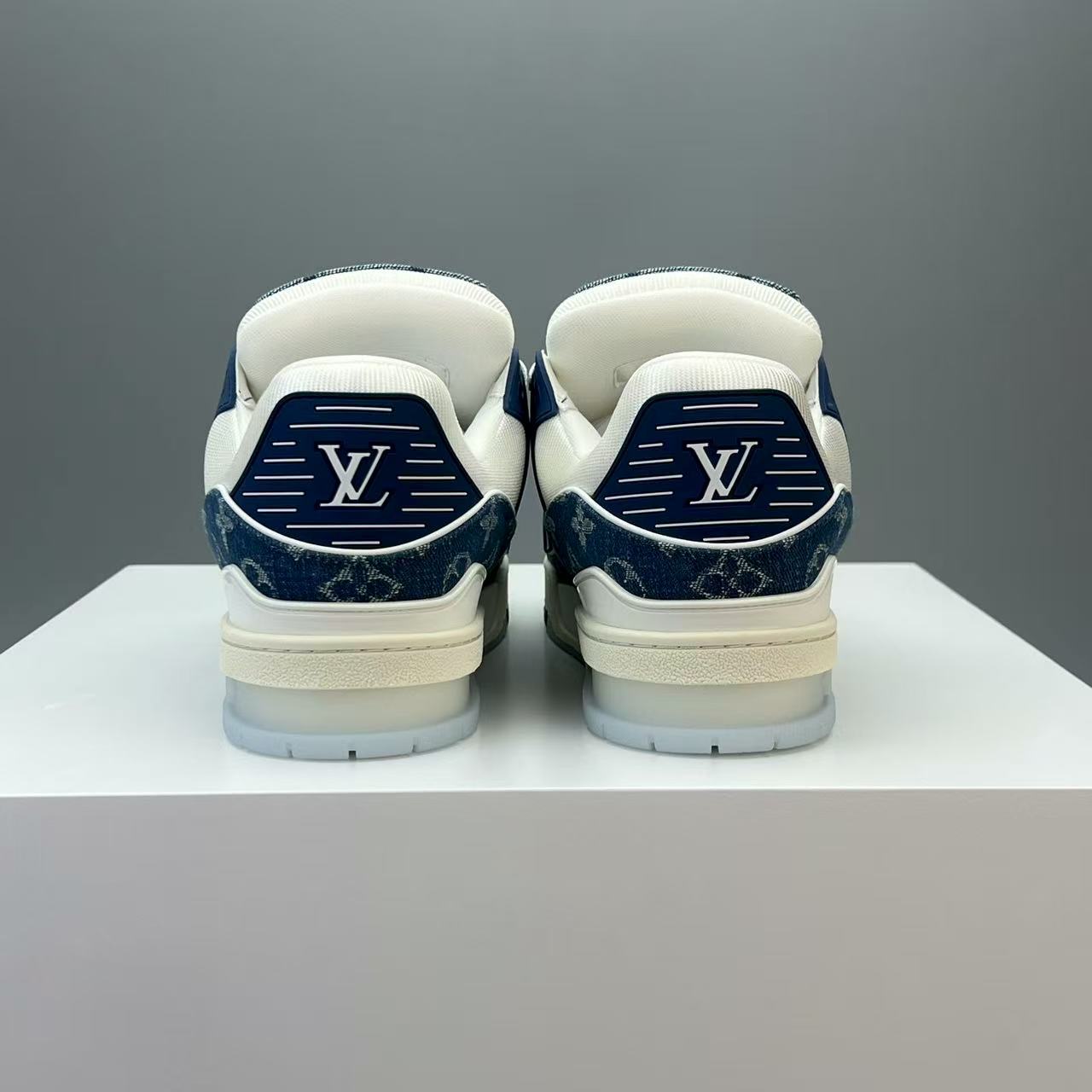 LV trainer blue denim crystal bottom