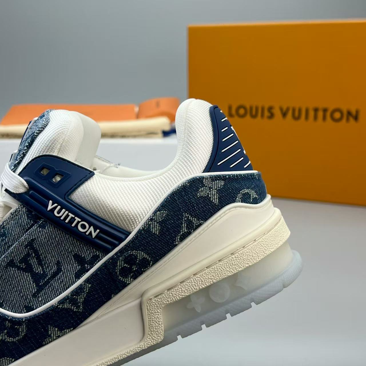 LV trainer blue denim crystal bottom